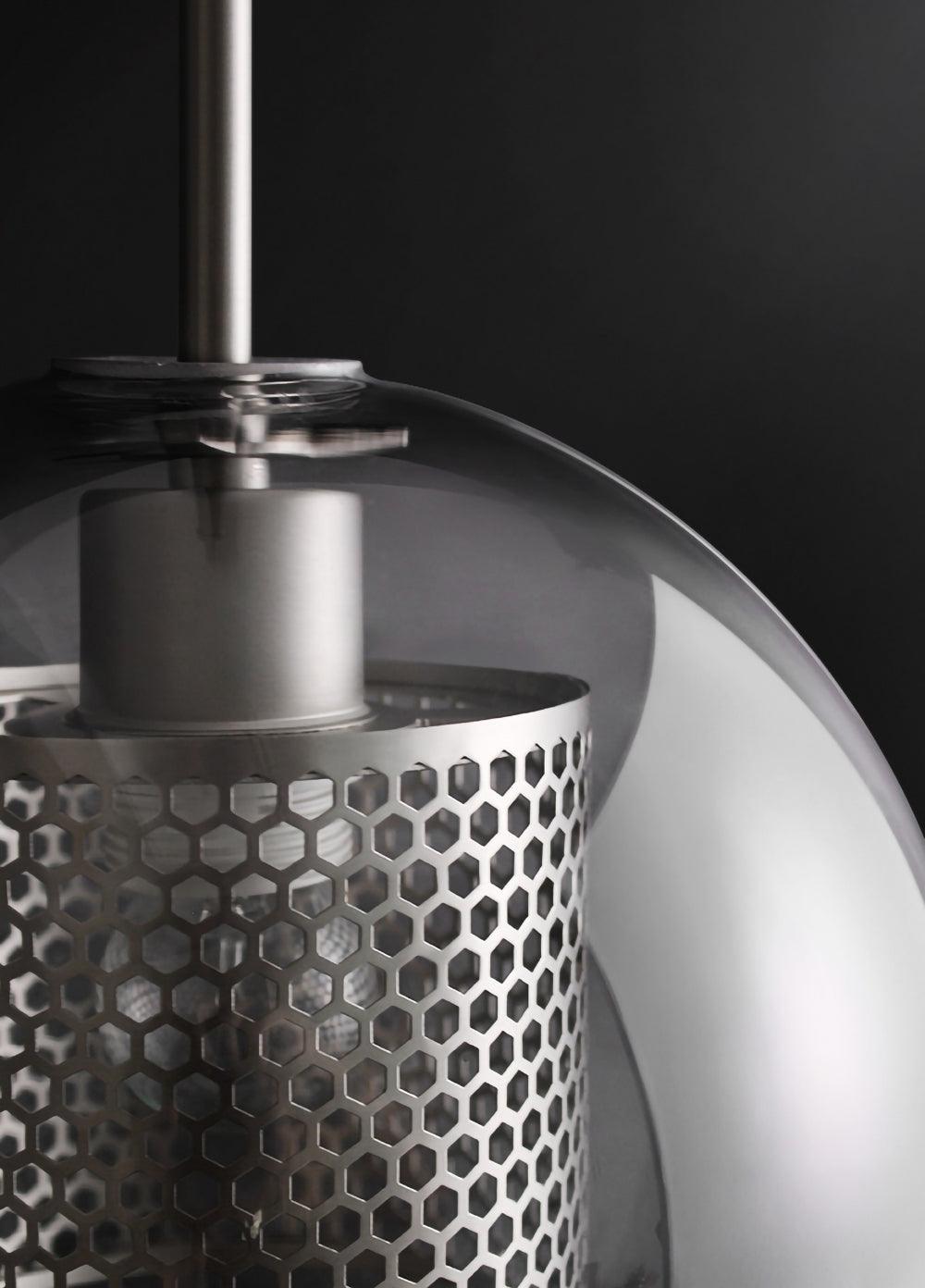 Close-up of perforated inner metal and outer glass