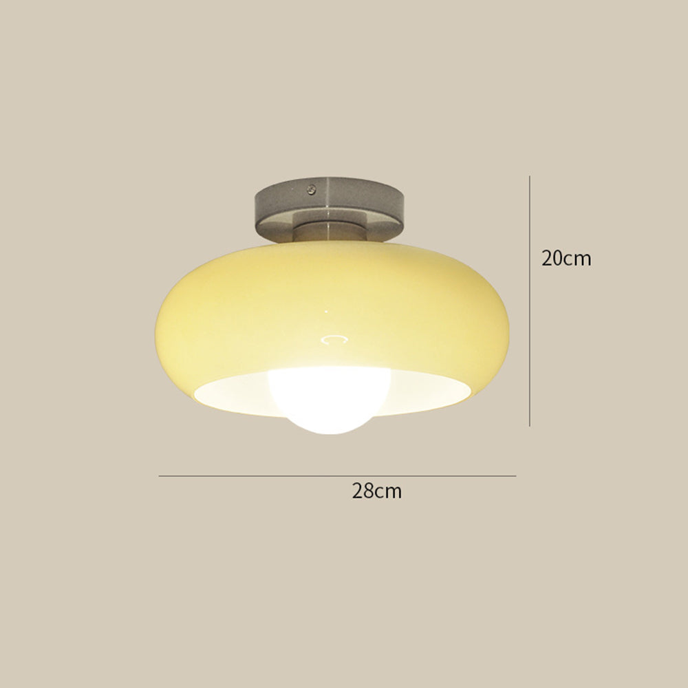 Chrome and cream glass ceiling light with an exposed bulb below the shade