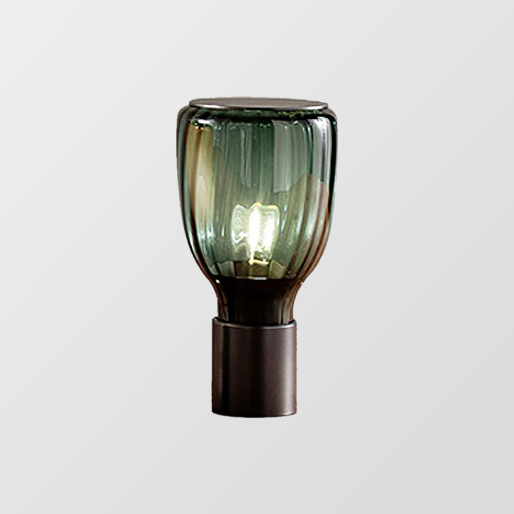 Dark Green table lamp with vertically ribbed transparent glass, a narrow lower neck and black cylindrical base
