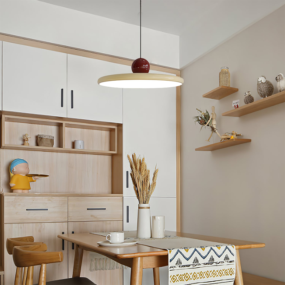 Lola beige disc and red sphere pendant in a kitchen dining area
