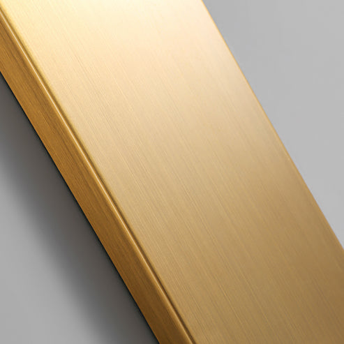 Diagonal close-up of the brushed-looking Gold rectangular backplate