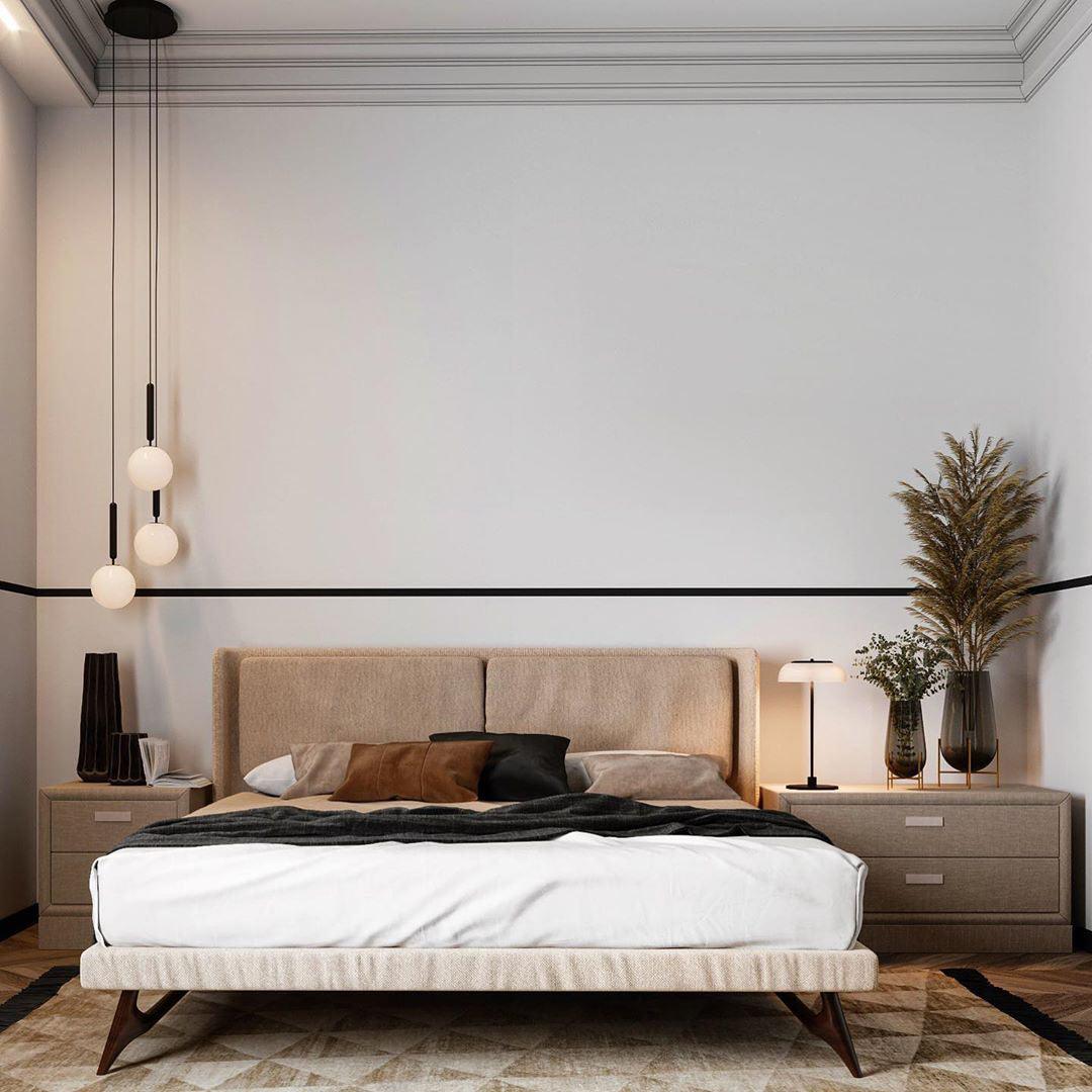 Small white globe cluster beside a bed