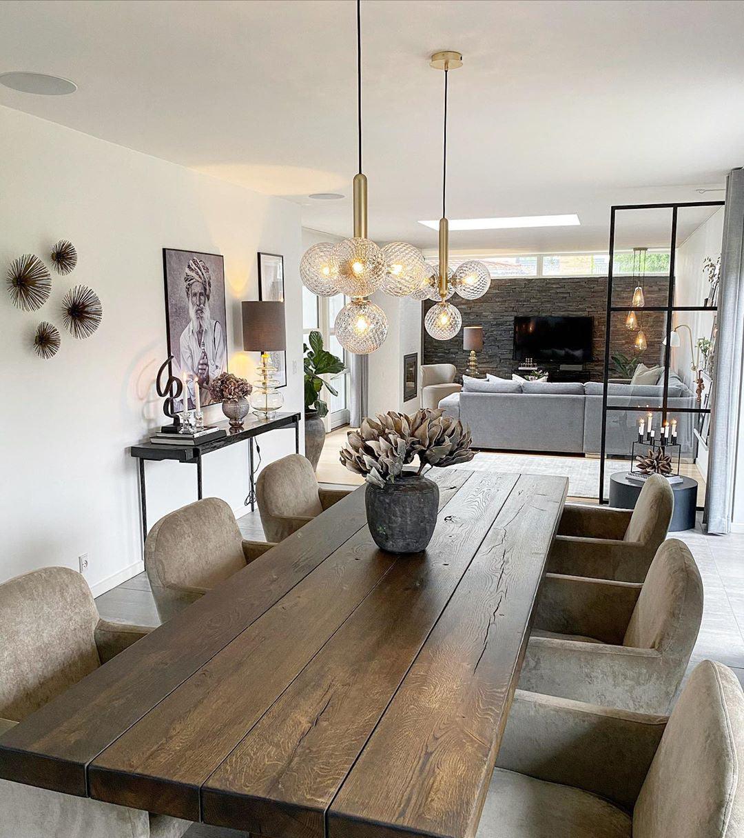 Clear clusters above a long wood dining table