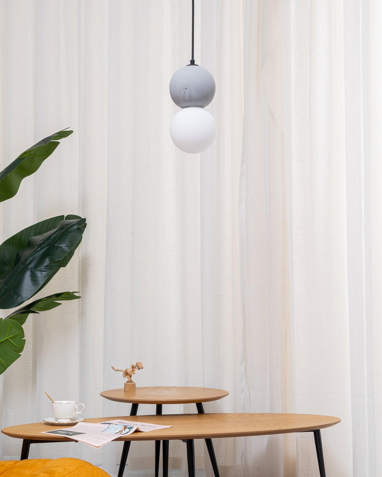 Origo Pendelleuchte: Zeitlose Eleganz aus Vulkanstein und opalem Glas für ein harmonisches Lichtspiel! - Cueteks