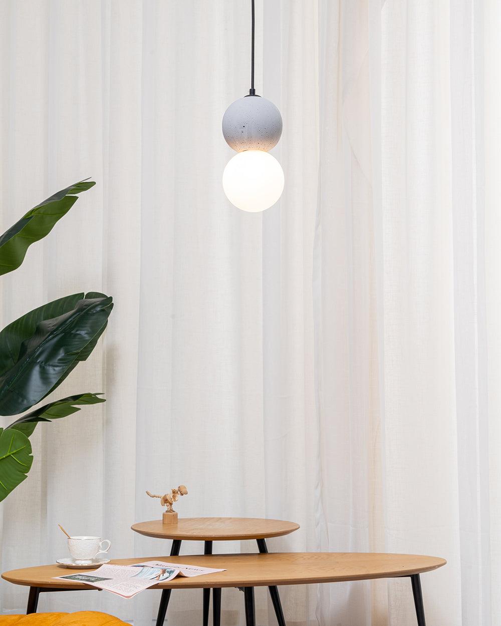 Origo Pendelleuchte: Zeitlose Eleganz aus Vulkanstein und opalem Glas für ein harmonisches Lichtspiel! - Cueteks