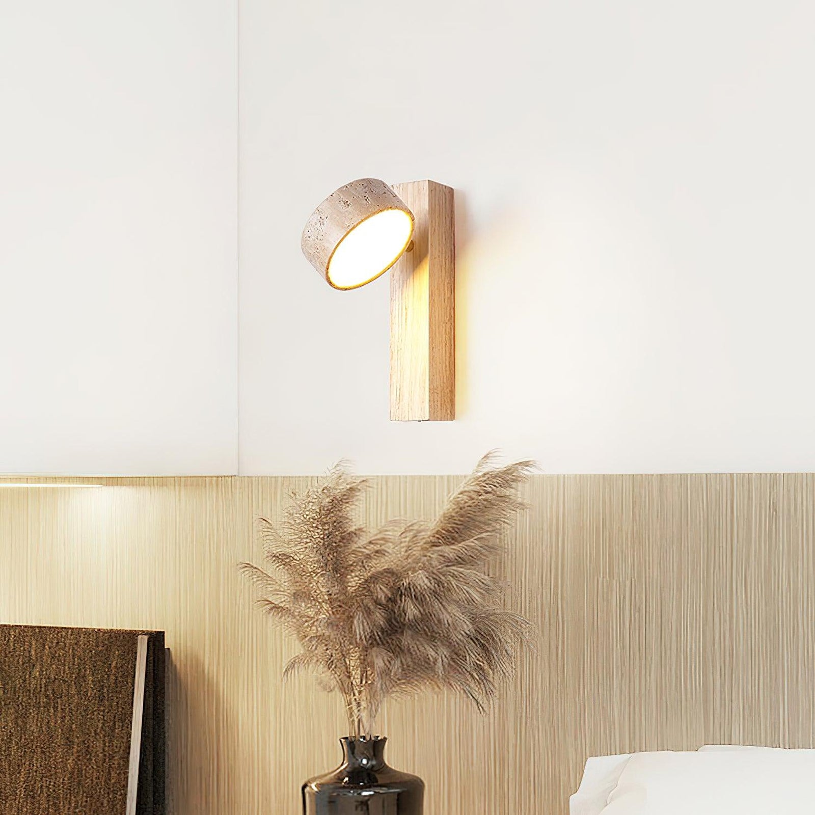 Original wood colour stone wall lamp with shade angled in a room