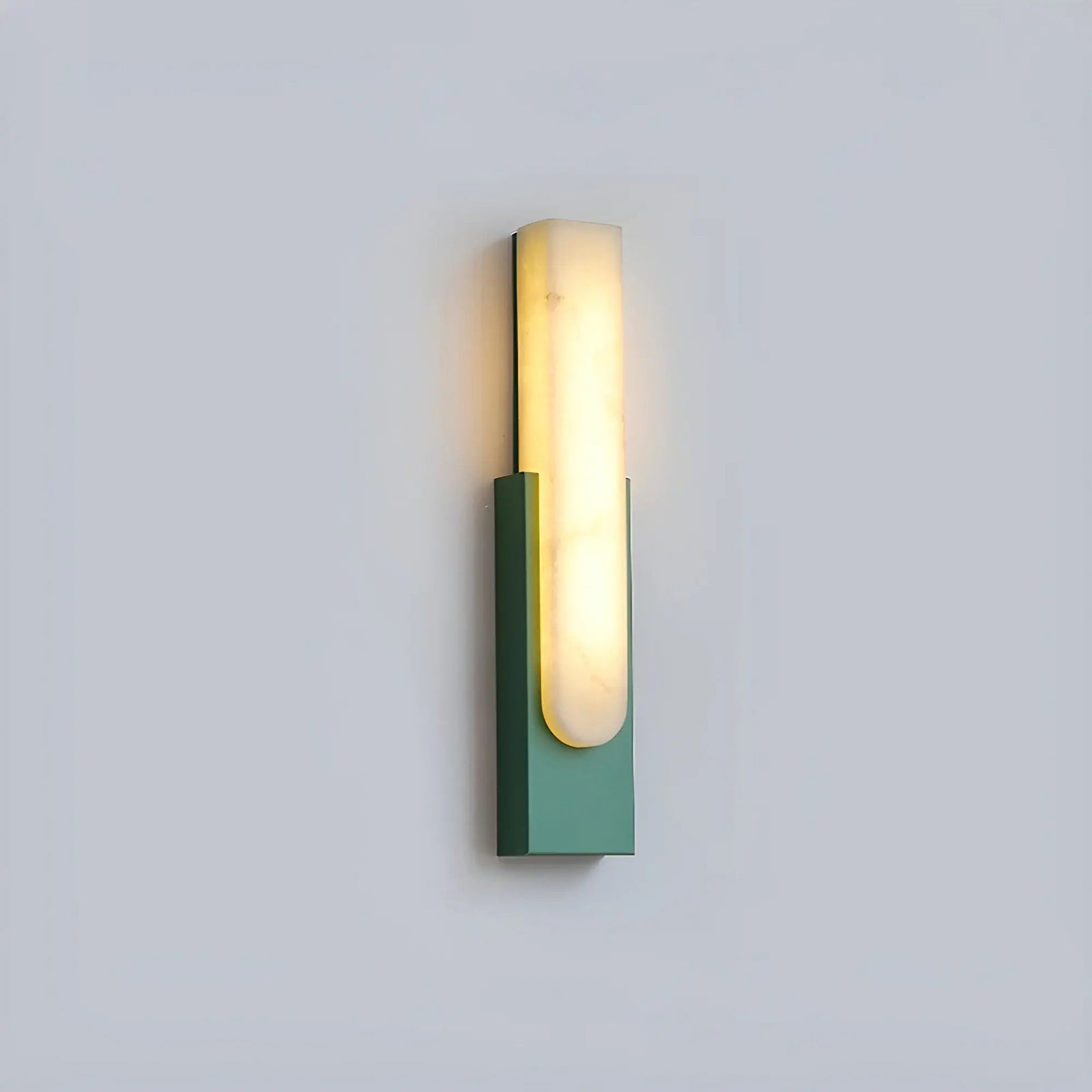 Green single wall sconce on pale background