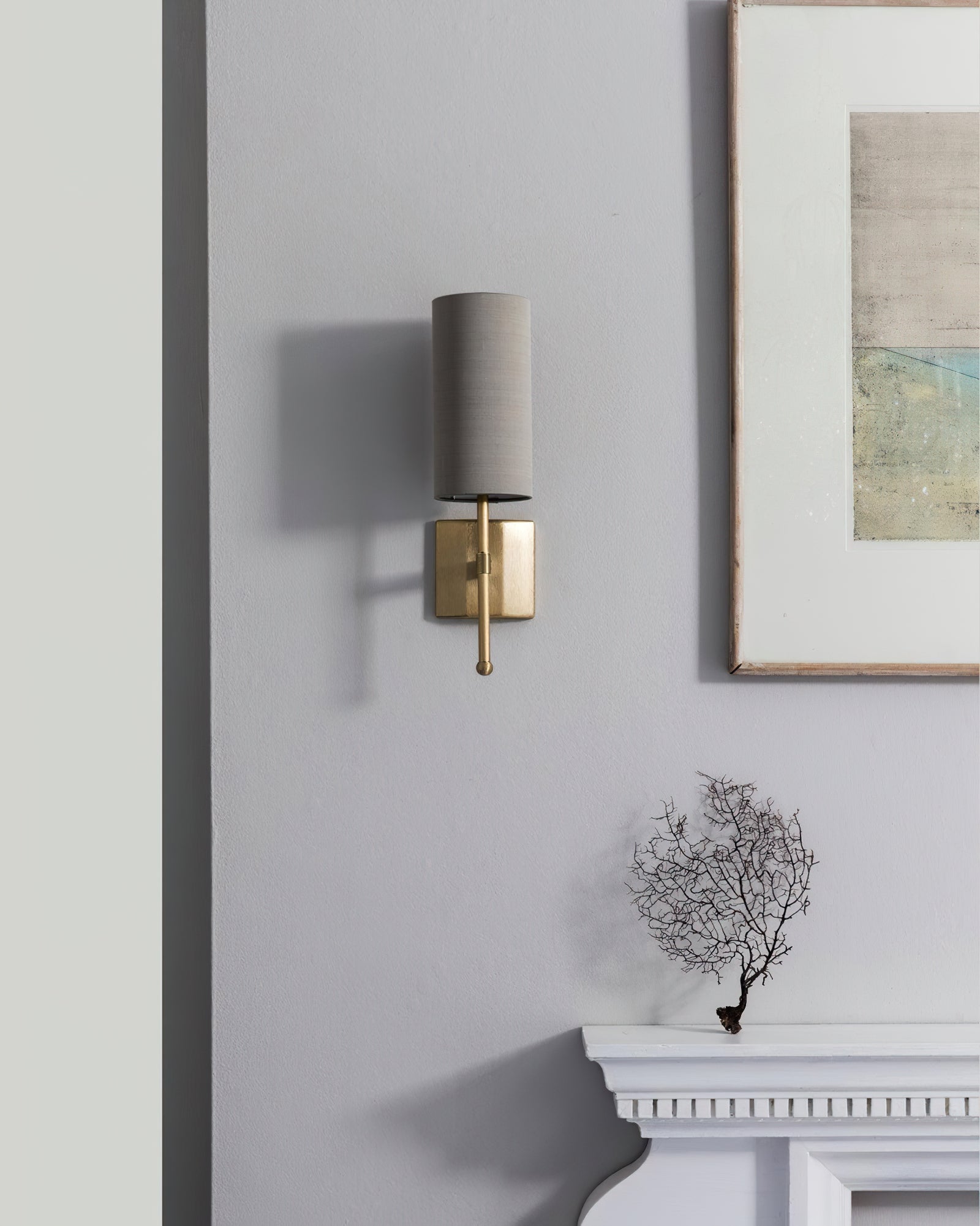 Silk Double Rod single grey shade above a mantel