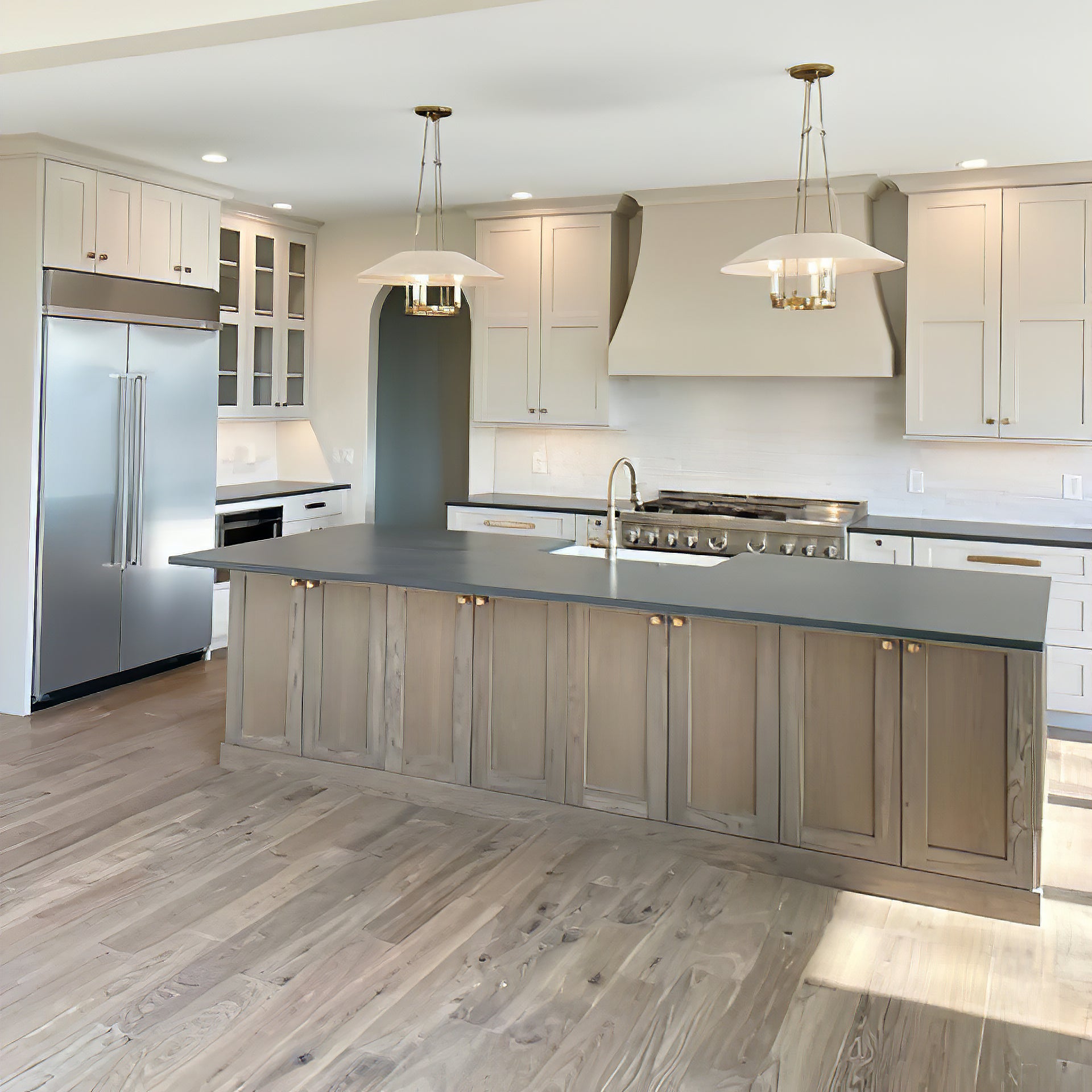 Kitchen overview with two Troy Archive island chandeliers