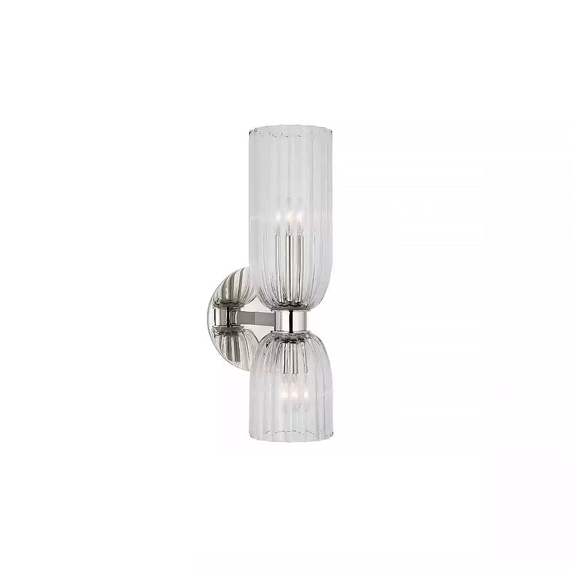 Polished Nickel double wall sconce with unequal clear ribbed glass cups, a short arm and a round backplate