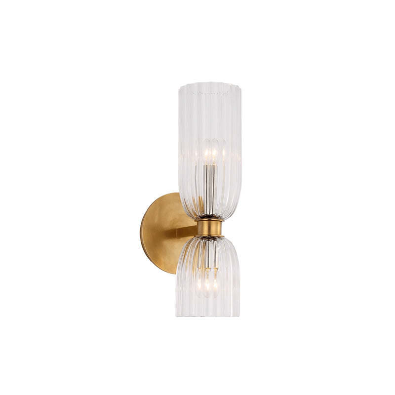 Antique Brass double wall sconce with a tall upper glass cup, shorter downward cup and round backplate