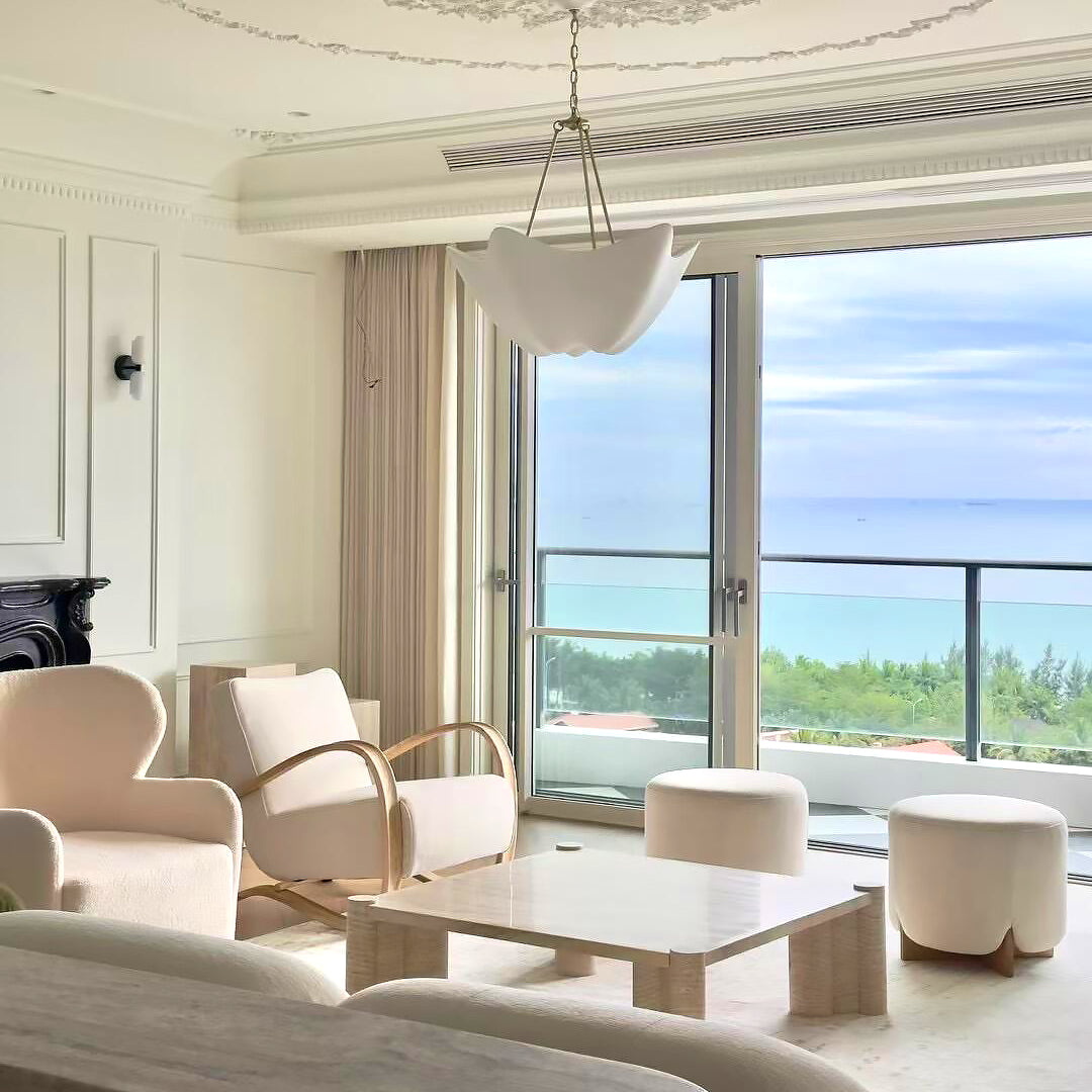 Cosima chandelier in a living room overlooking the sea