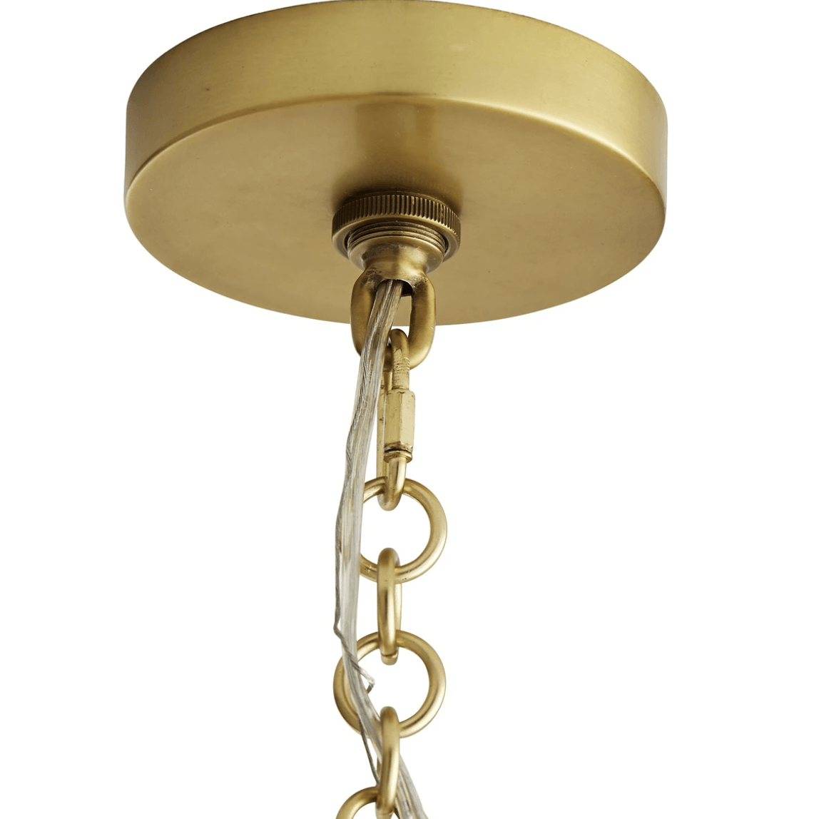 Close view of a gold circular ceiling canopy, chain links and a wire running beside the chain