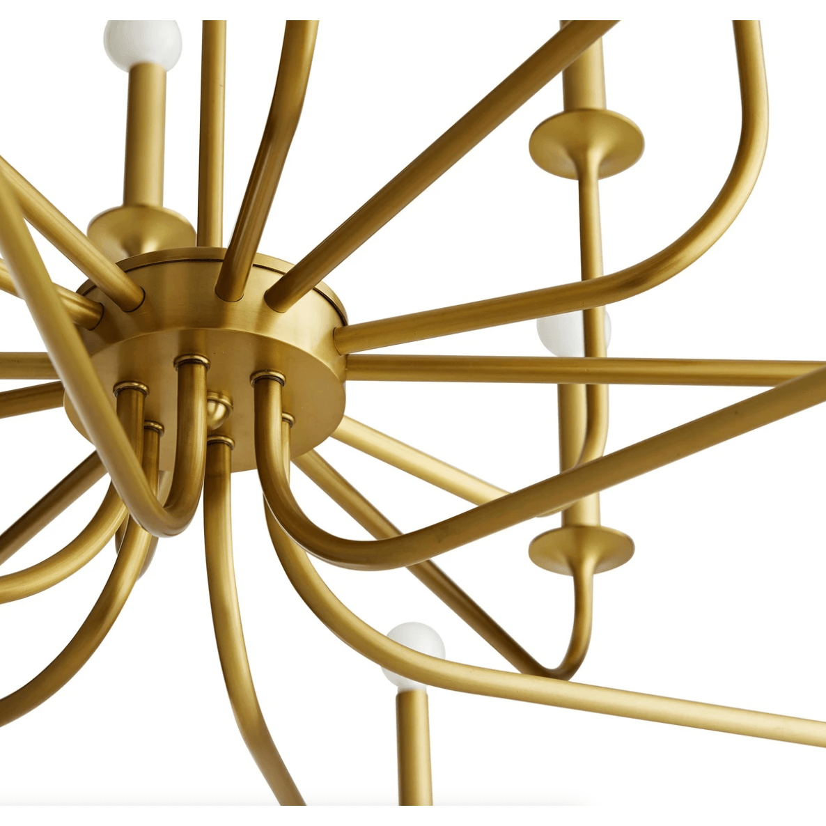 Underside detail of a gold chandelier hub with multiple curved arm attachments and saucer holders