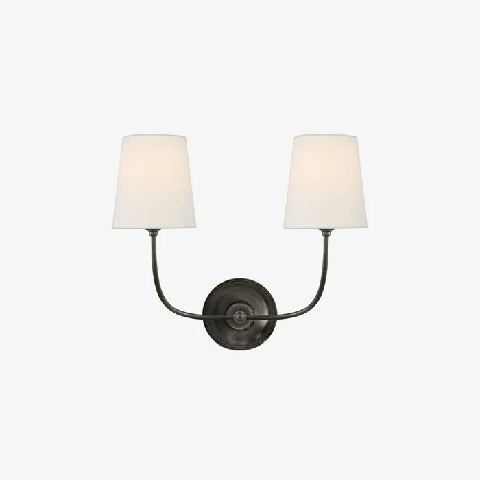 Black Vendome double wall light with two illuminated white shades on white.