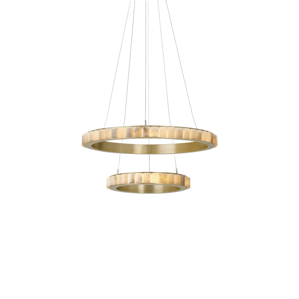 Larger upper and smaller lower pale segmented rings with gold-tone inner bands on white