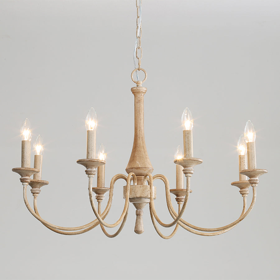 Pale eight-light chandelier with curved arms, candle-style sleeves and matching chain against a gray background