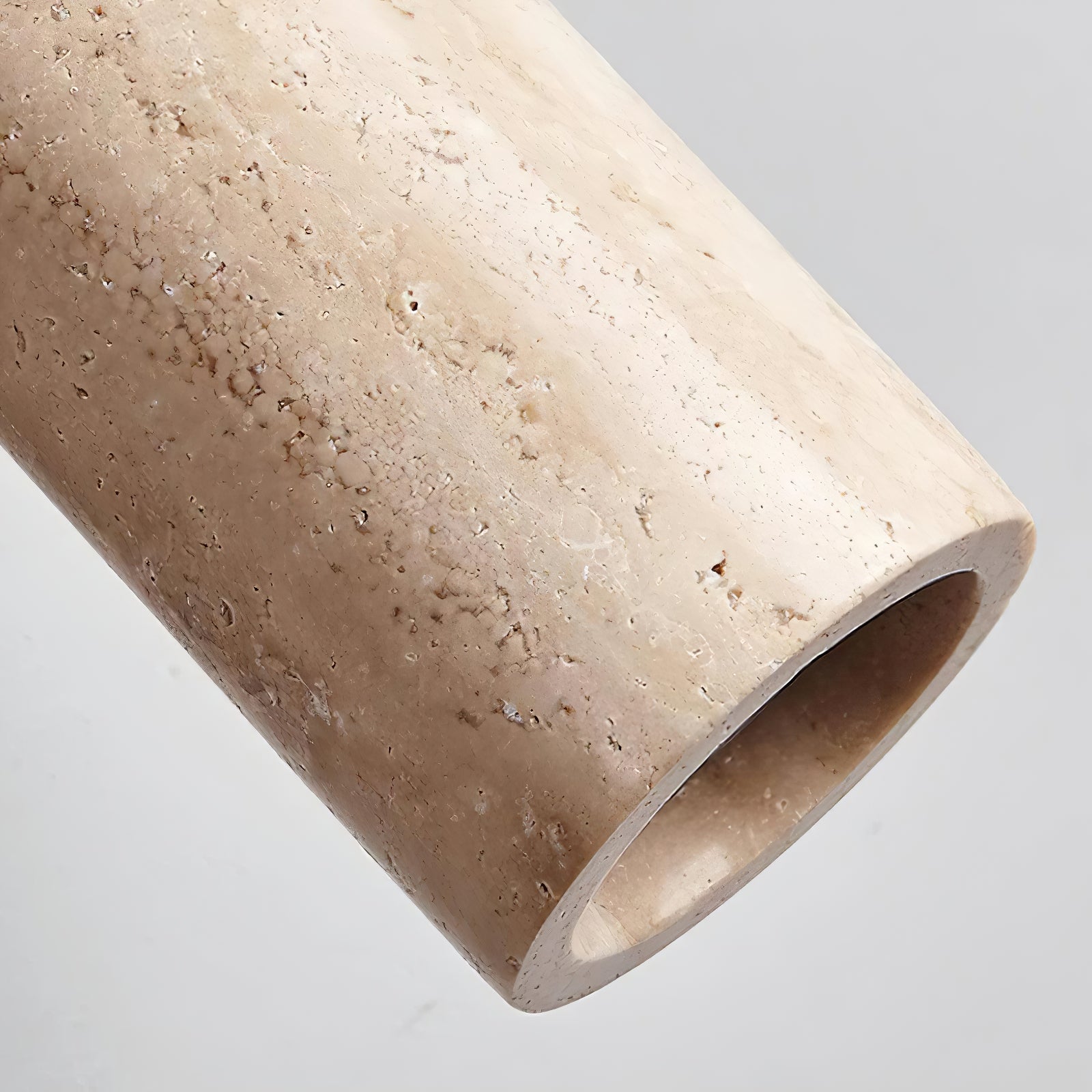 Mireille porous stone cylinder edge and recessed light opening close-up