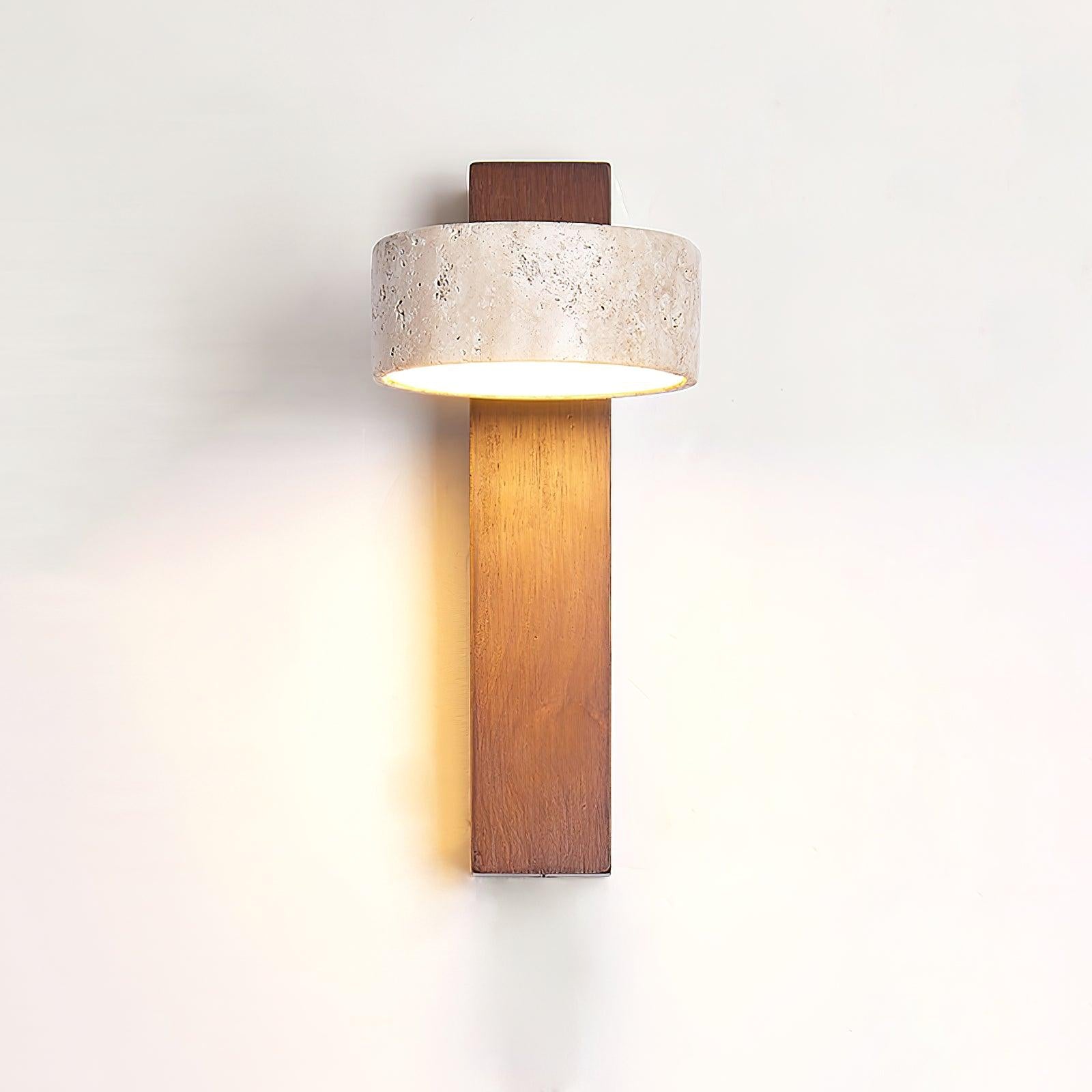 Walnut-colour wall lamp shown casting light down its wooden plate