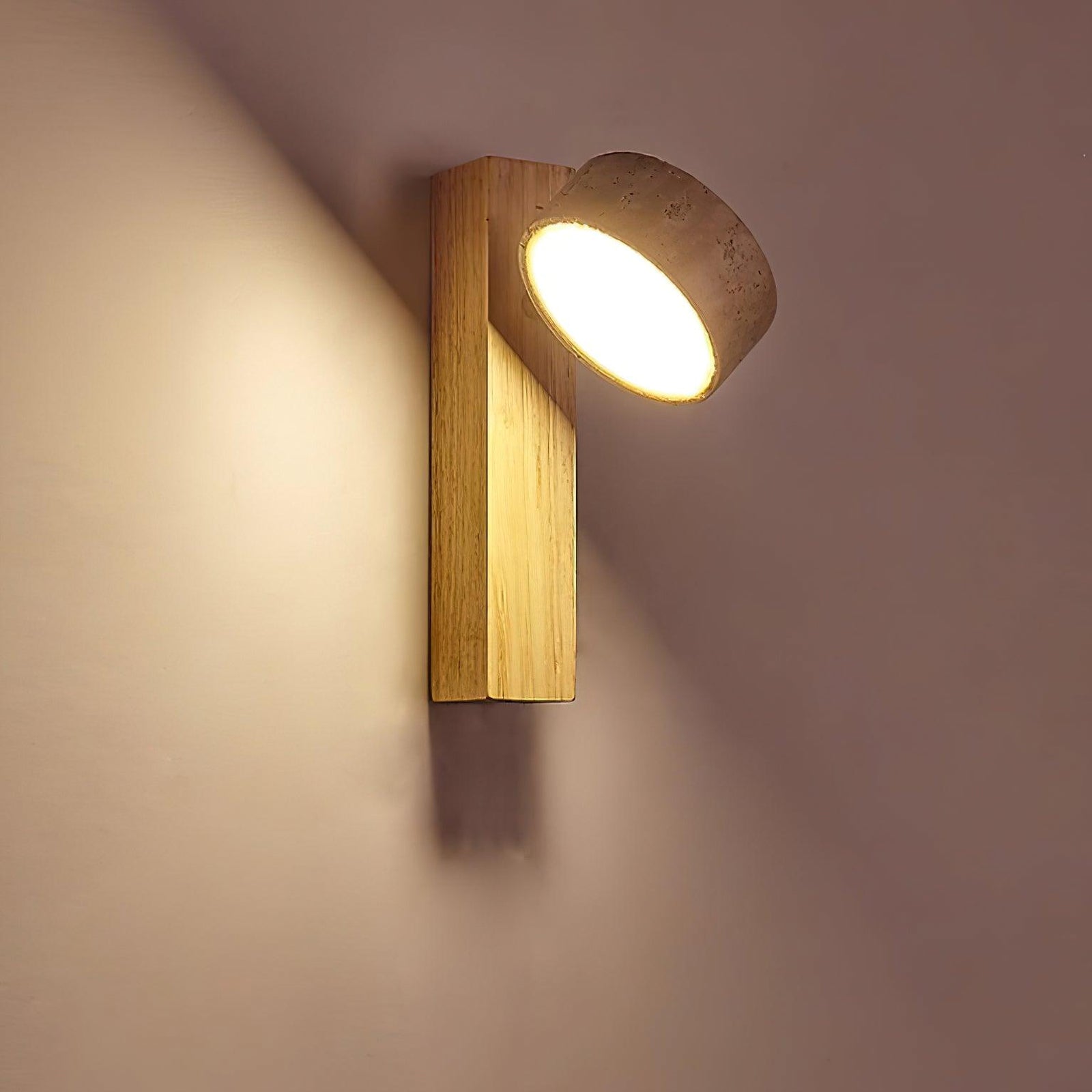 Angled travertine shade with a bright round light face