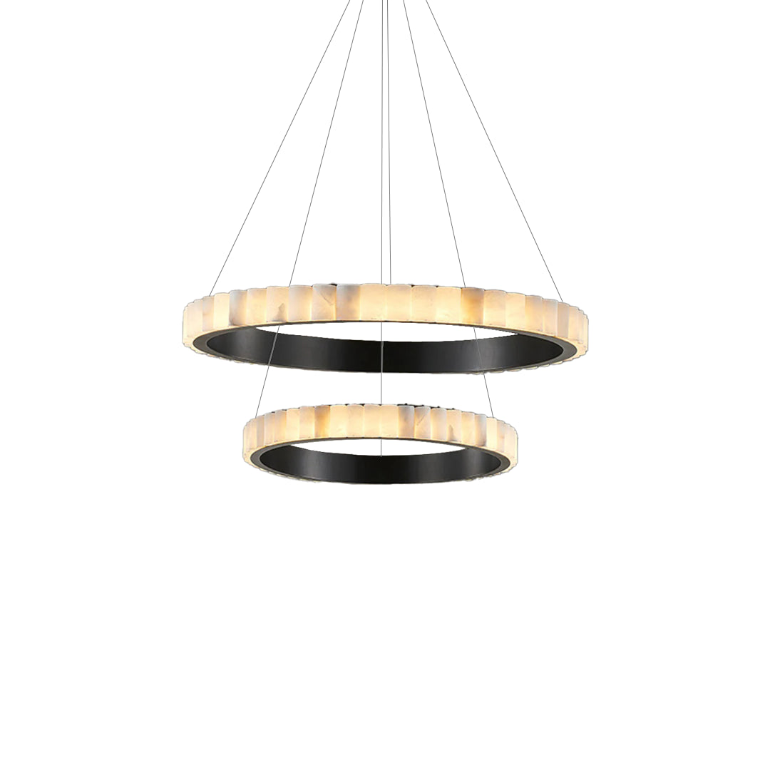 Two pale segmented rings with black inner bands suspended at different heights on white