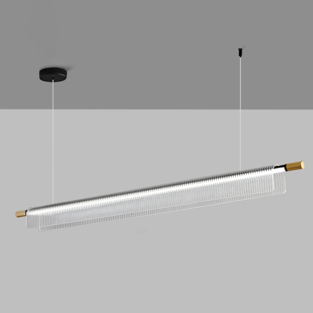 Black bar and canopy with clear ribbed acrylic, gold-tone endcaps and two suspension points on gray