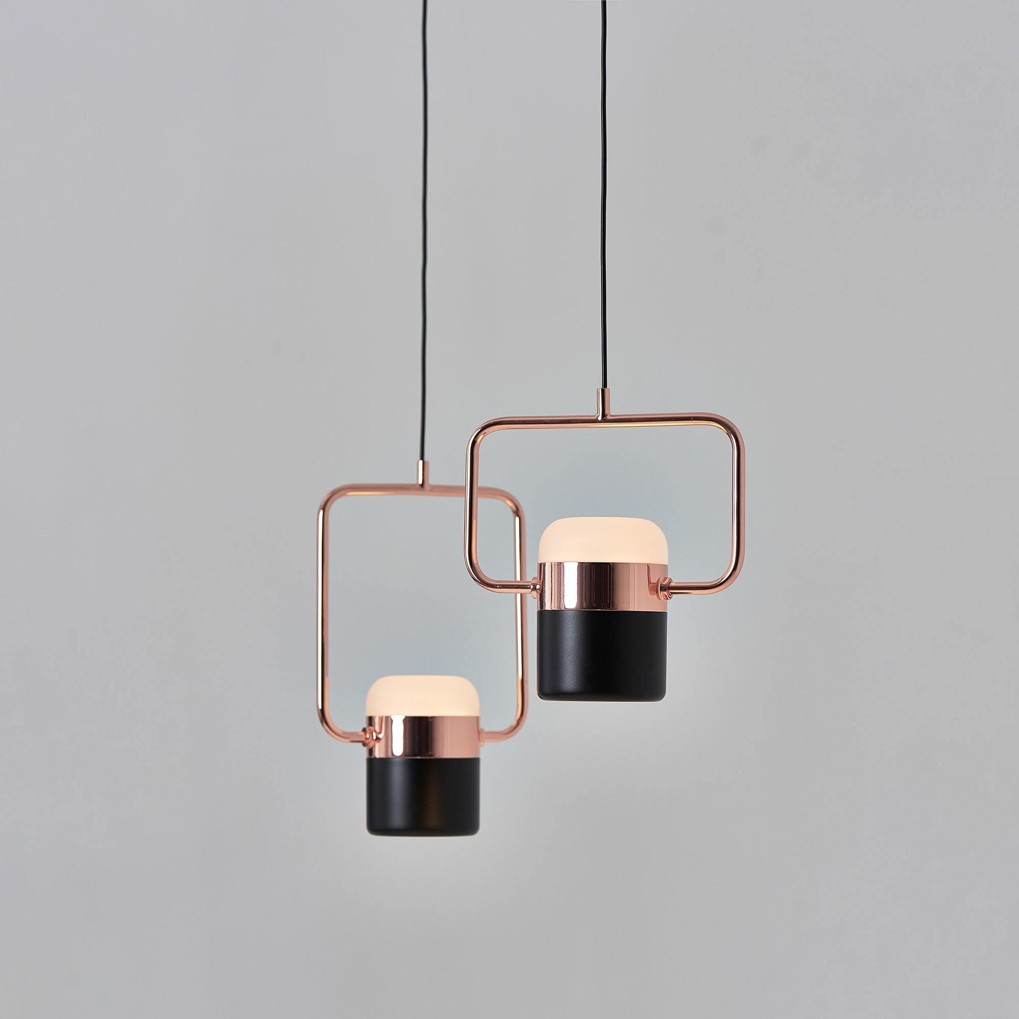 Adjustable LED pendant light with an open geometric frame