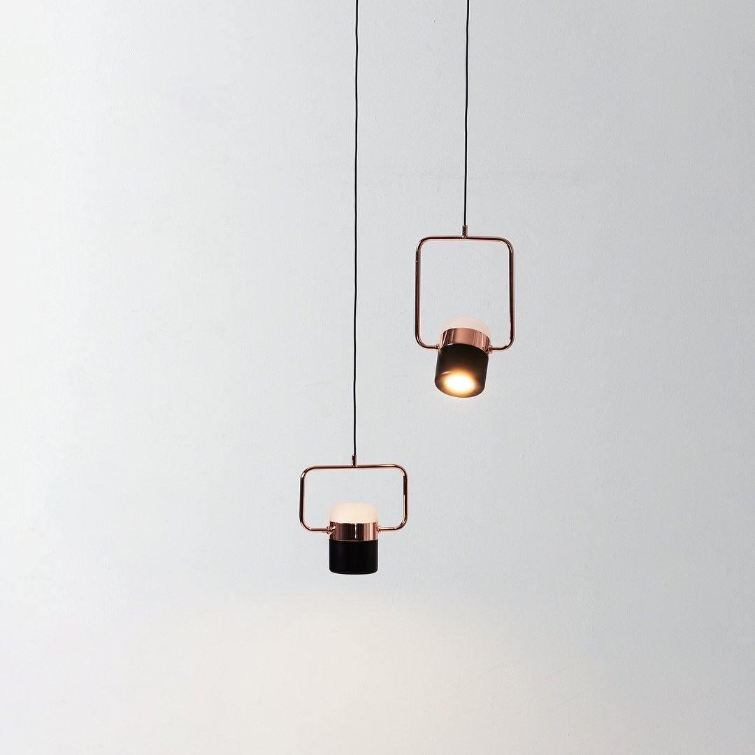Geometric LED pendant light with adjustable cylindrical heads