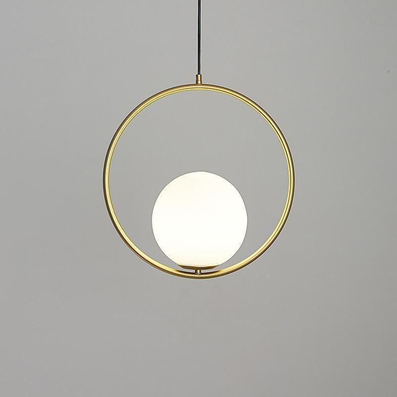 Brass-coloured circular frame cradling a white glass globe at its lower curve