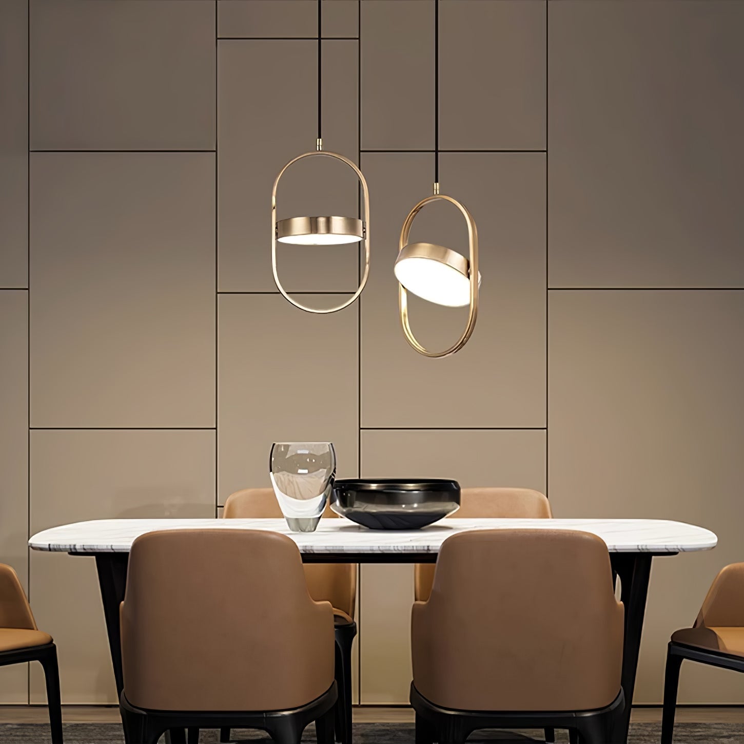 Gold oval pendants above a dining table