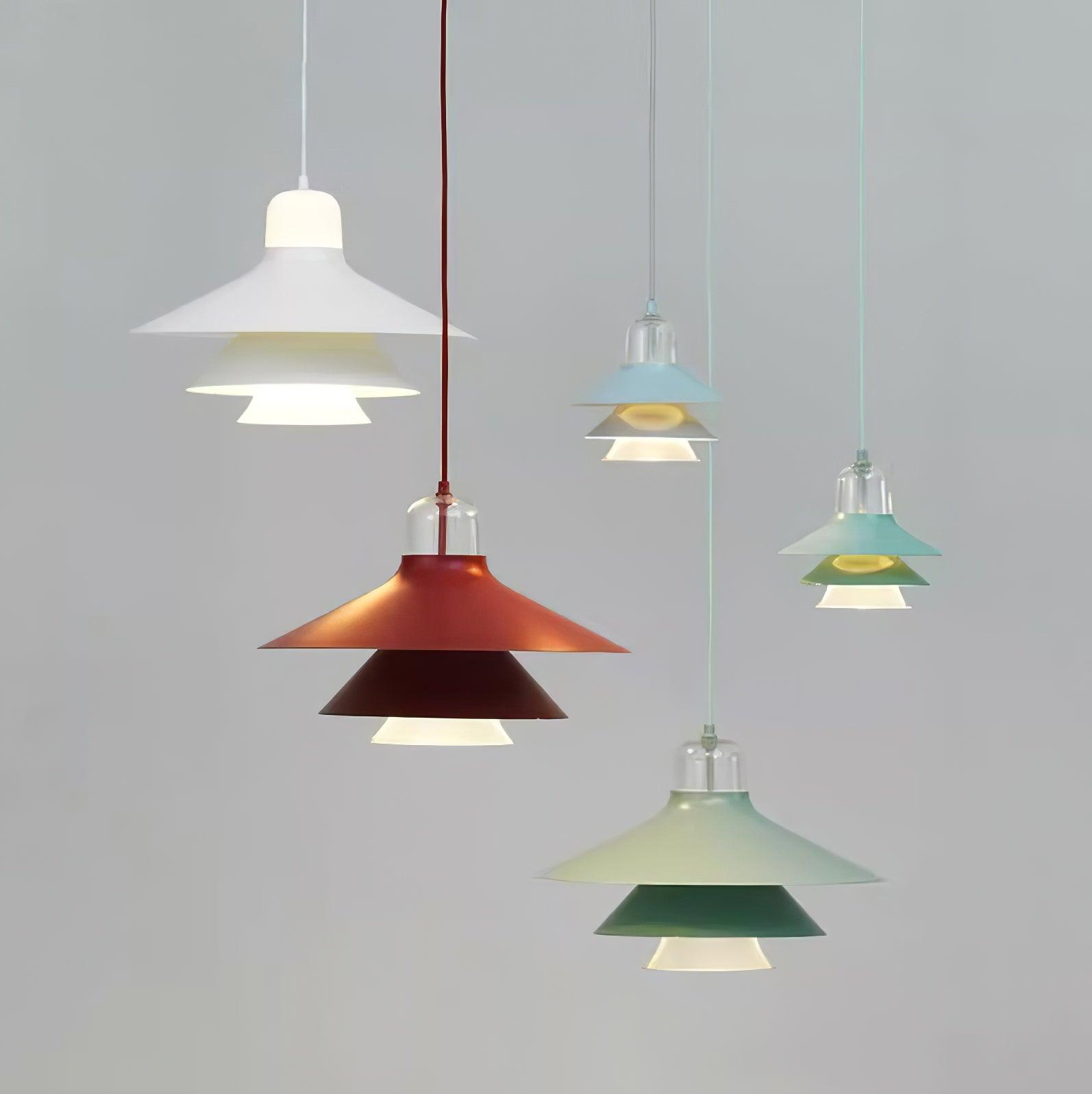 Mixed-colour pendant grouping at varied heights
