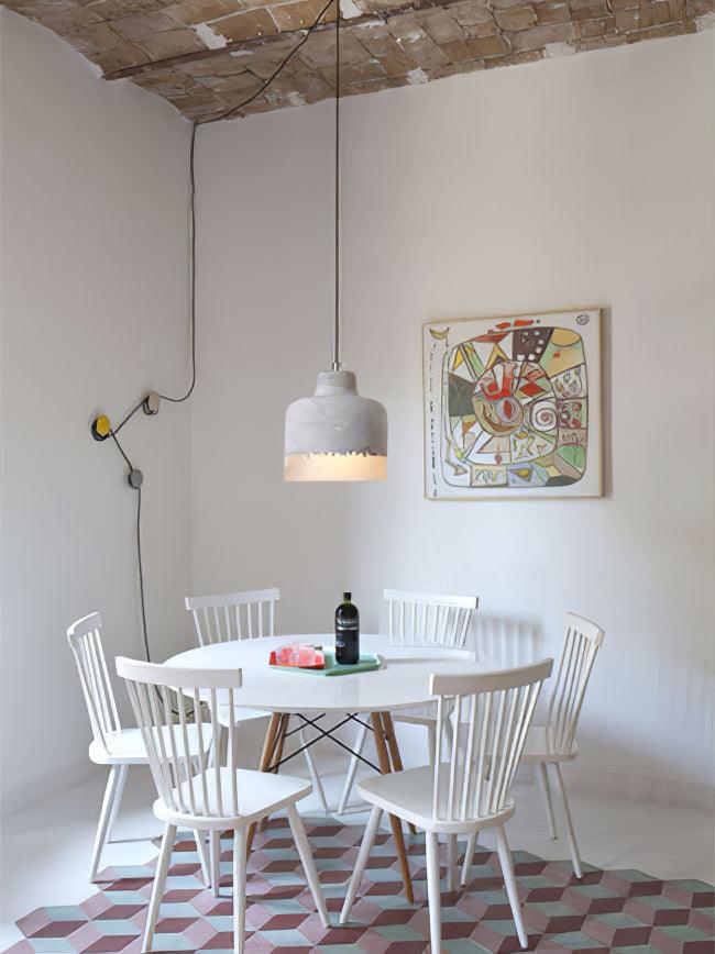 Rounded Delia pendant above a small dining area