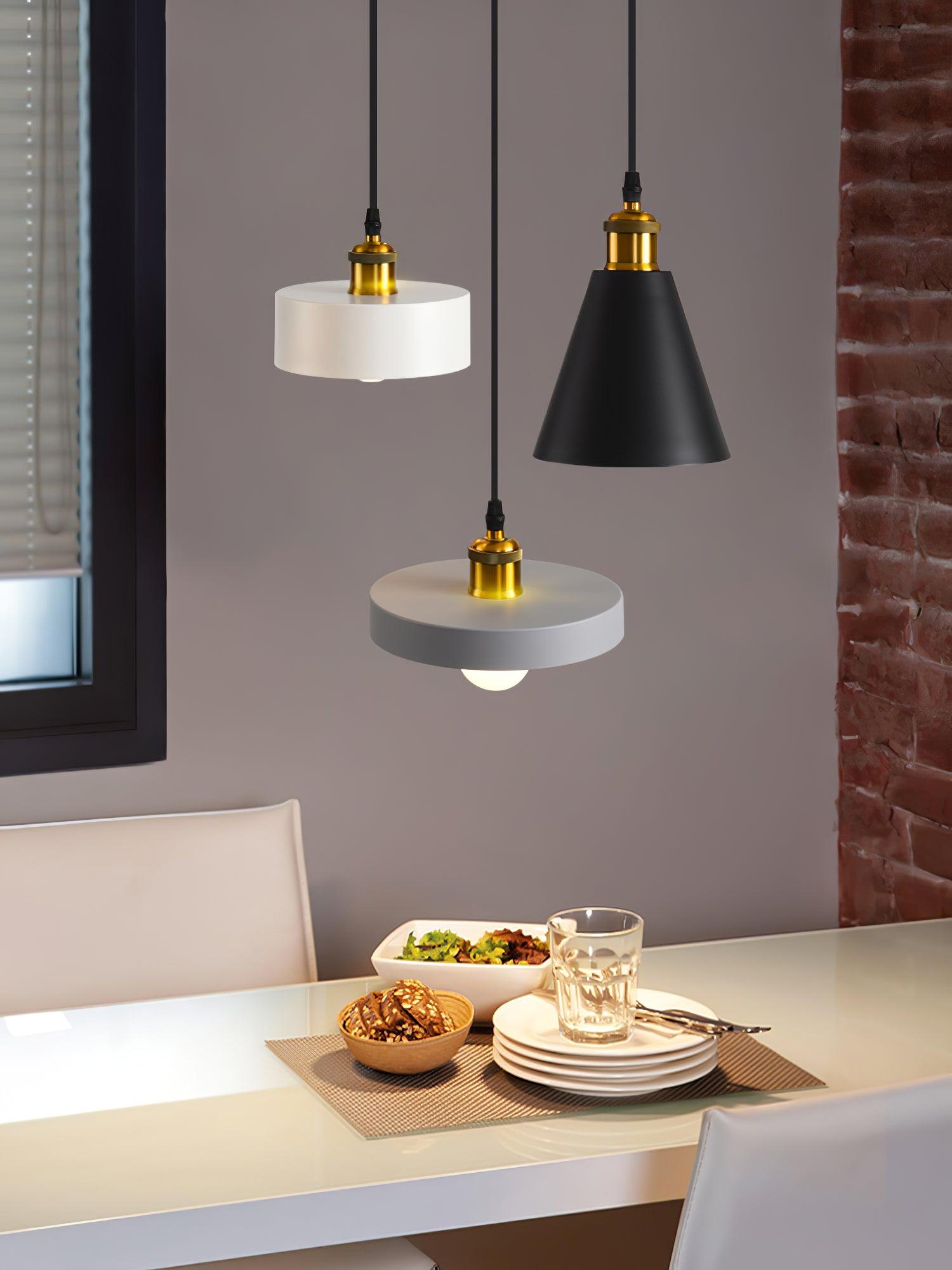 Black cone with pale drum and disc pendants