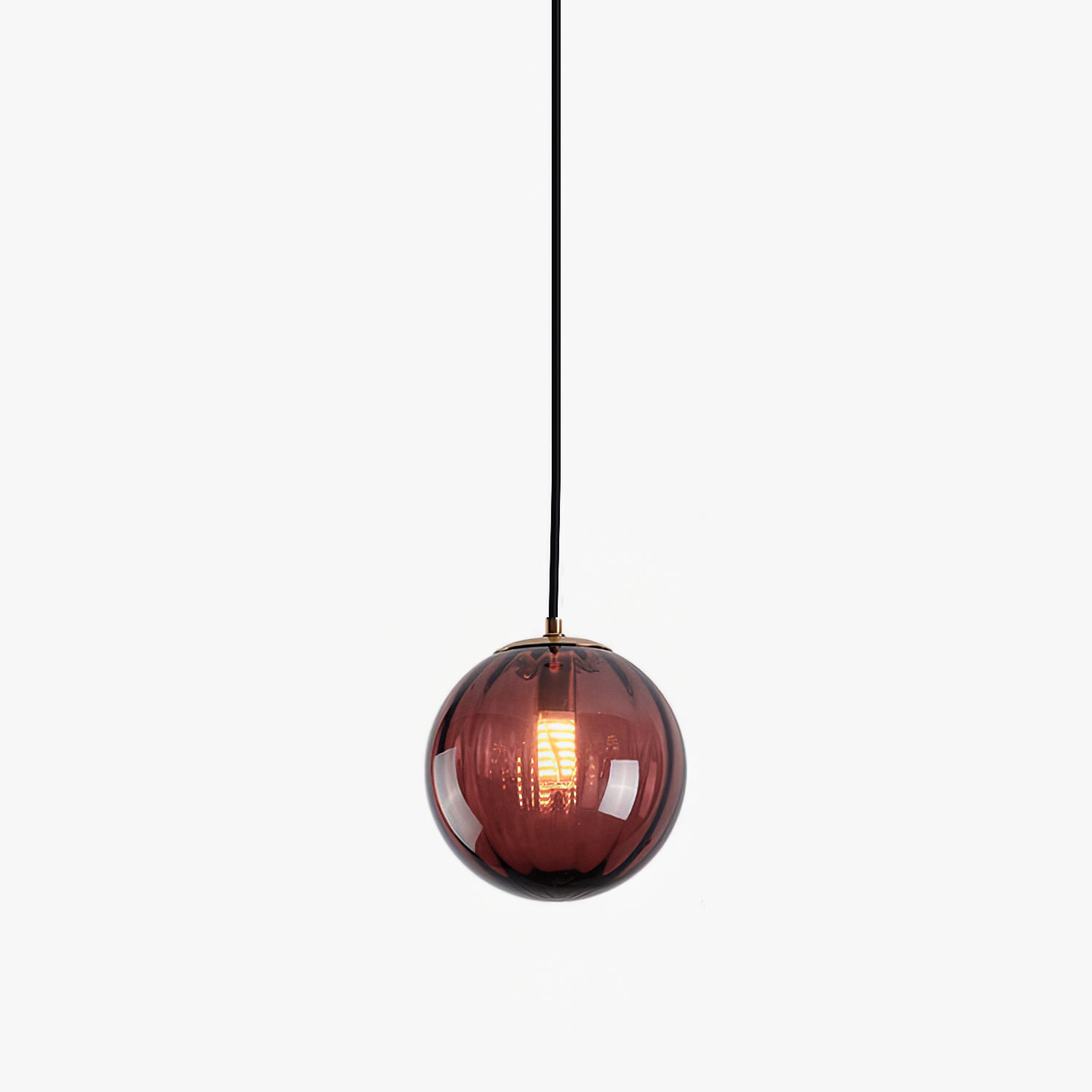 Paola pendant light with a coloured glass globe and small metal cap