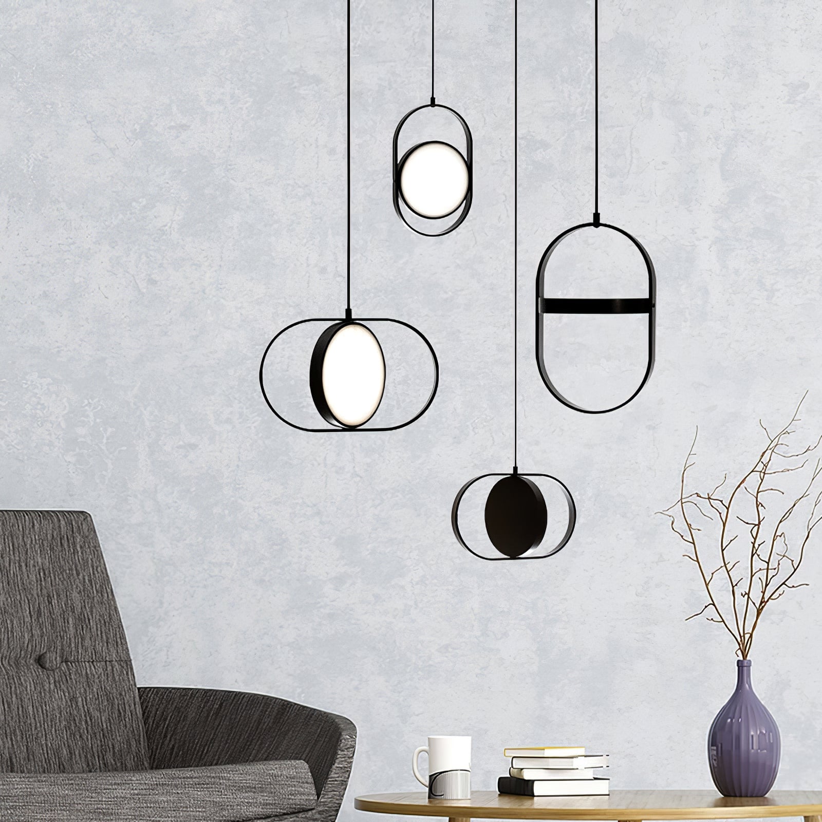 Black KUU pendant group above a cabinet