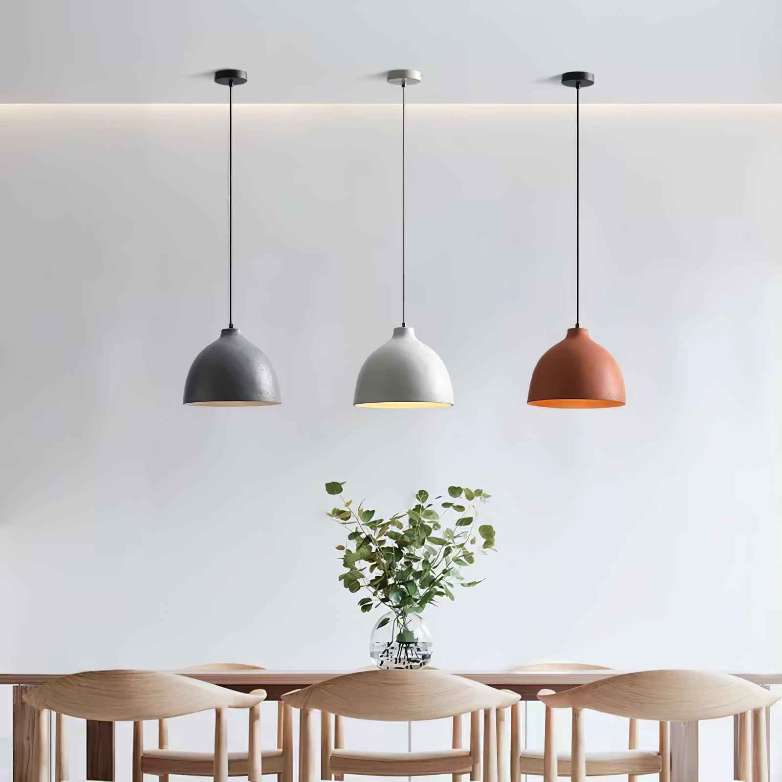Coloured pendant arrangement in a bright dining room