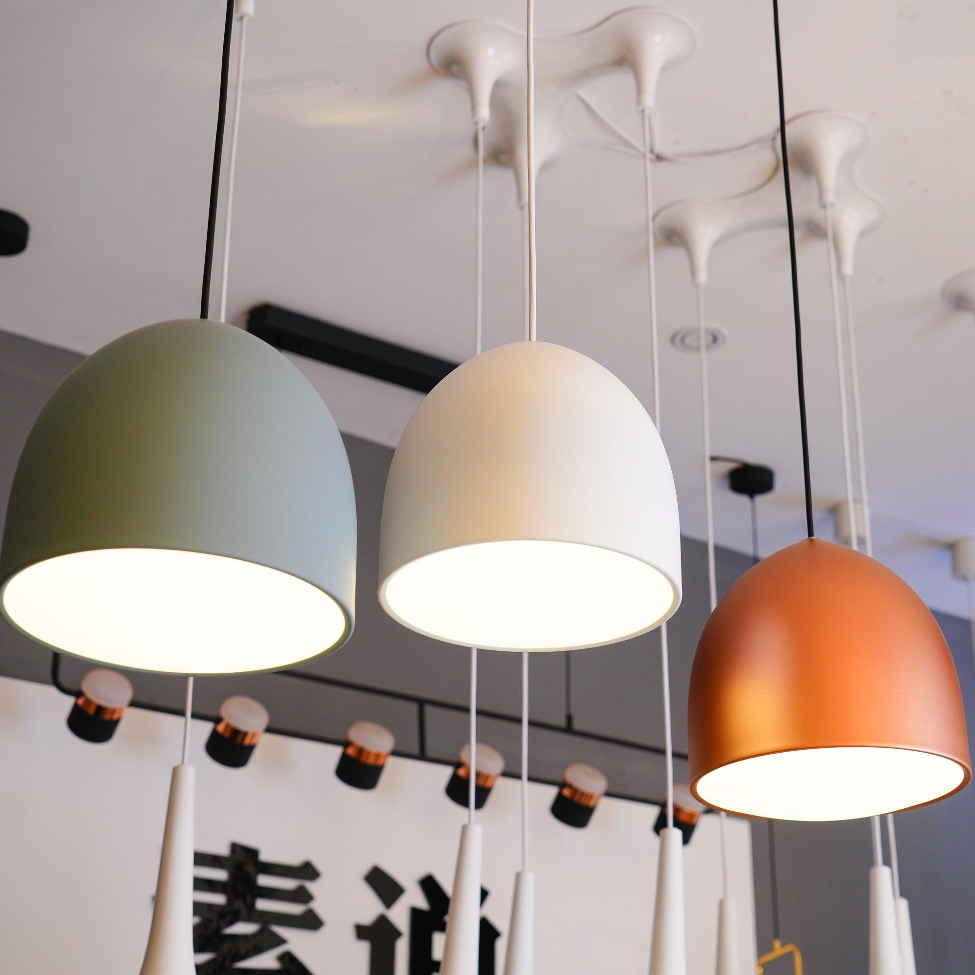 Lit bell shades in a showroom display