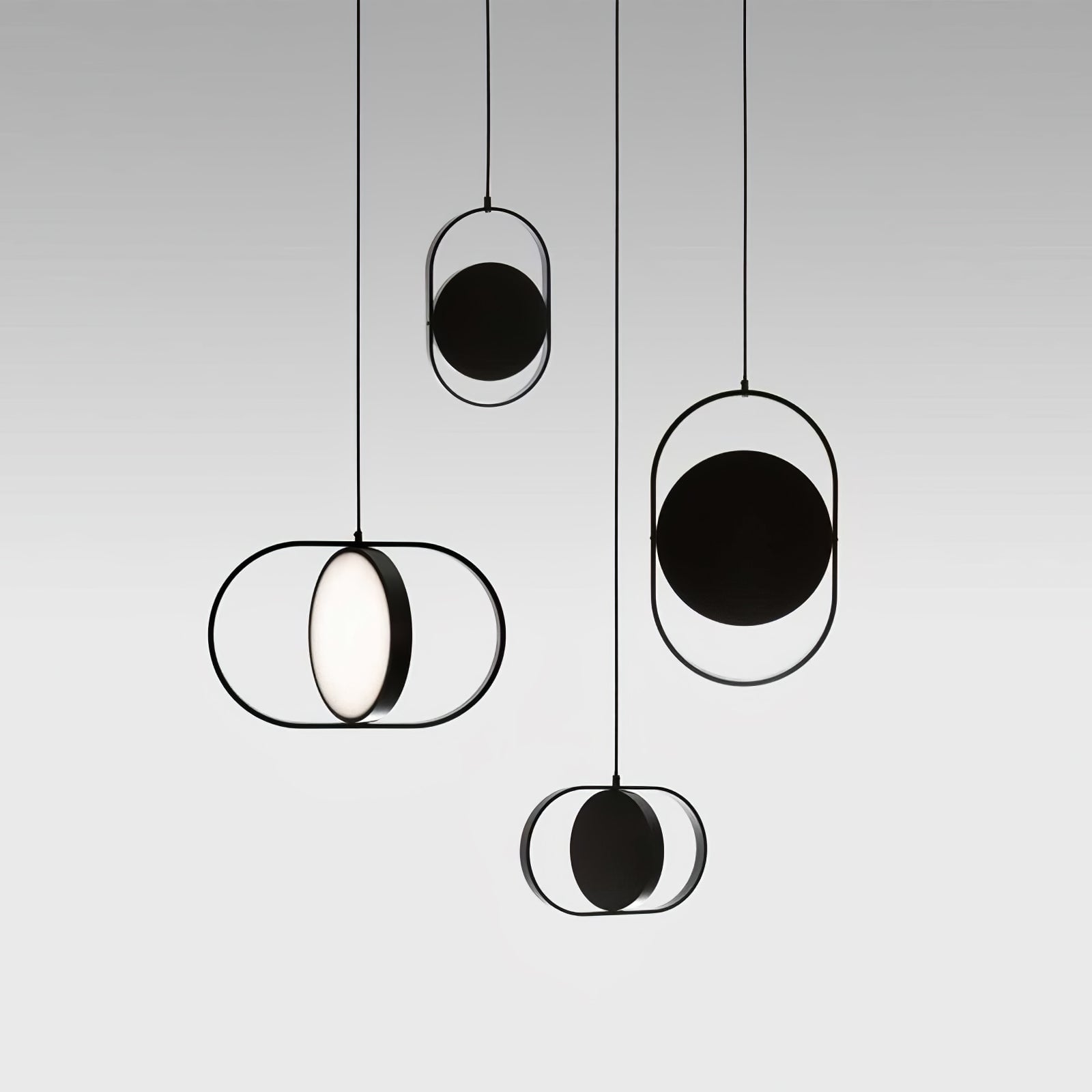 Black oval frames with contrasting disc orientations