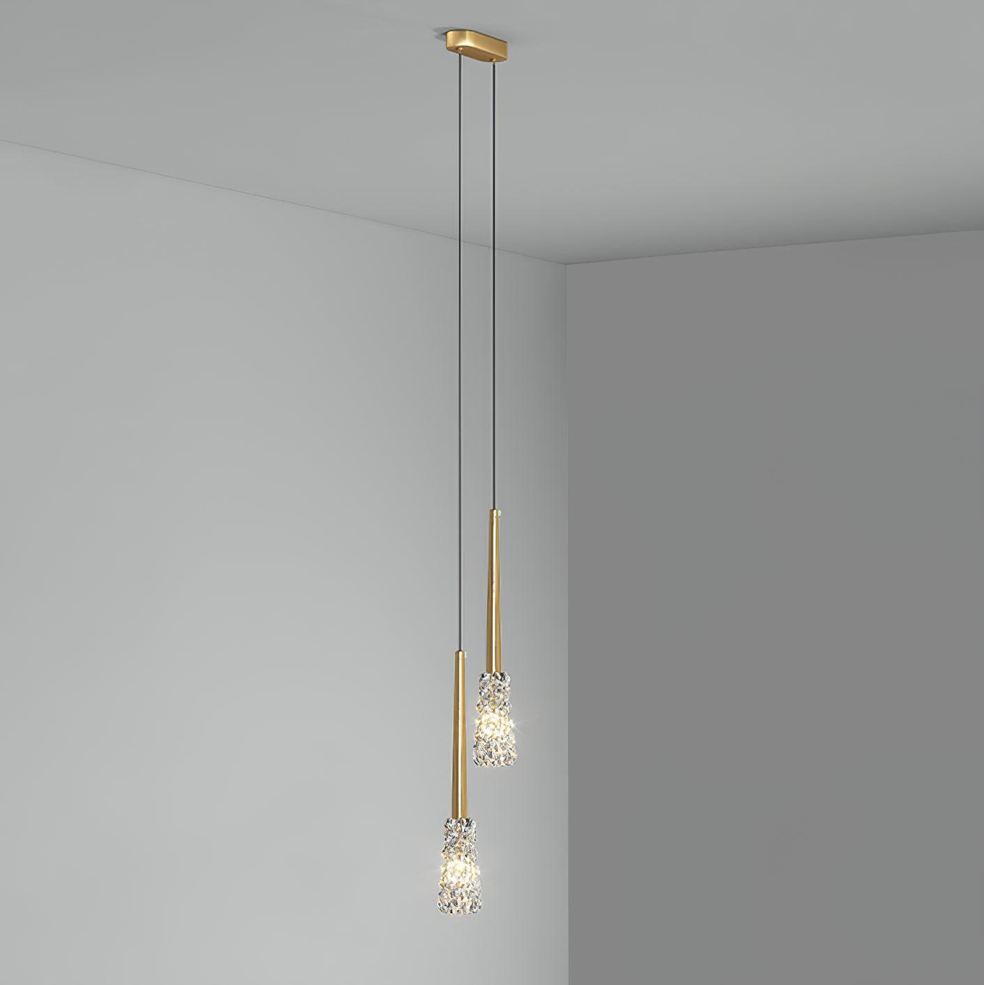 Two Mozzi pendant heads at different heights beneath a shared gold canopy