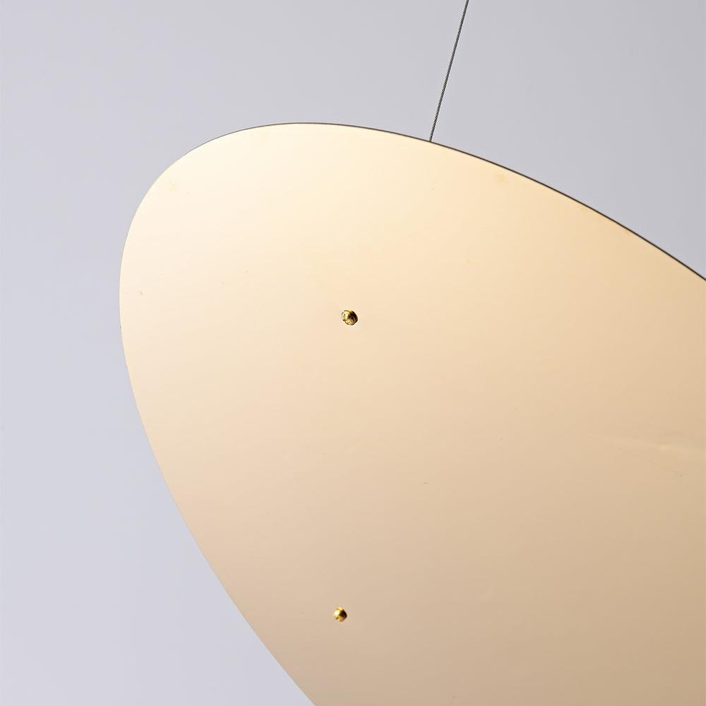 Close-up of pale Gold circular reflector surface