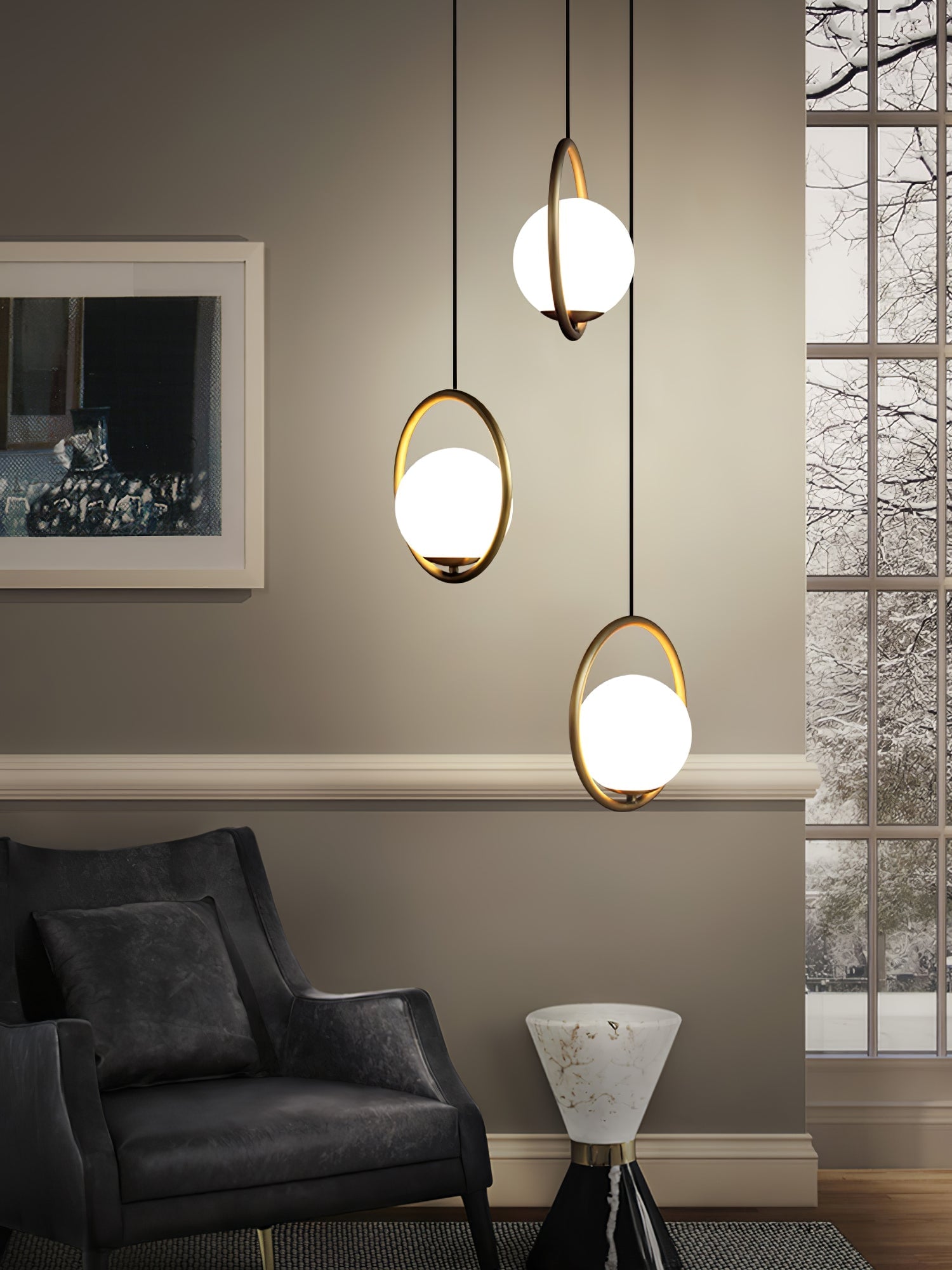 Three circular frame pendants at different heights