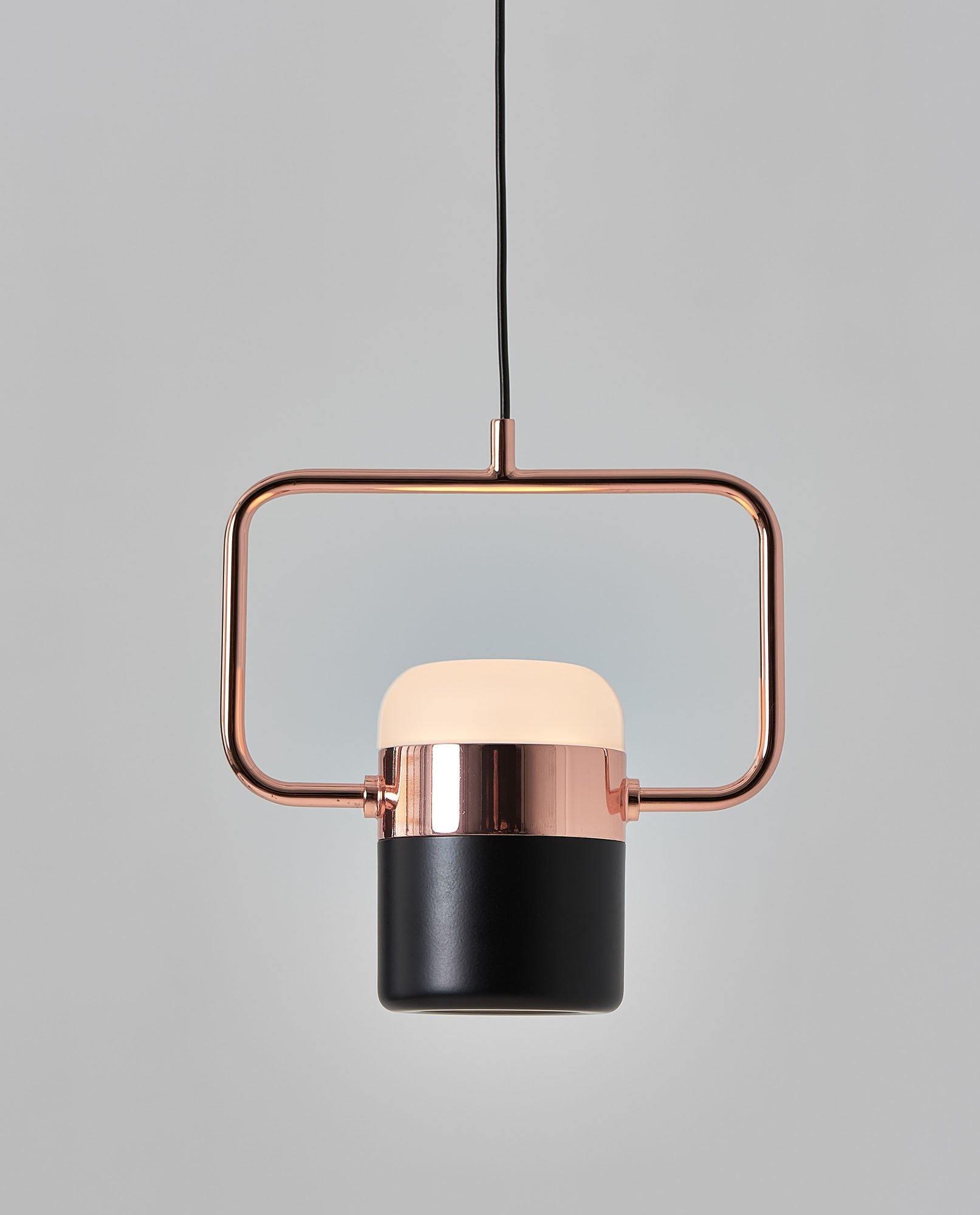 Geometric LED pendant light with adjustable cylindrical heads