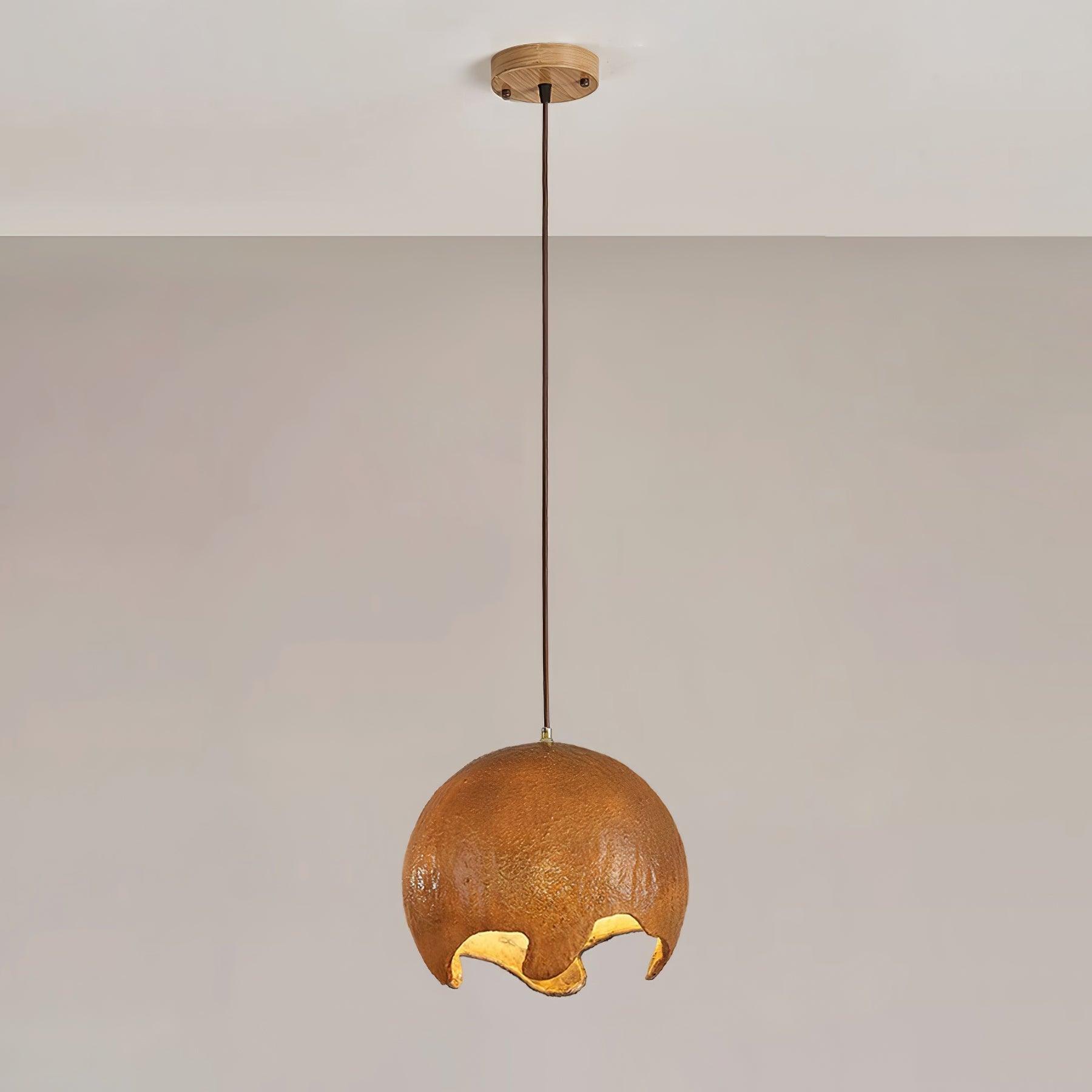 Brown textured globe pendant with an irregular open lower edge