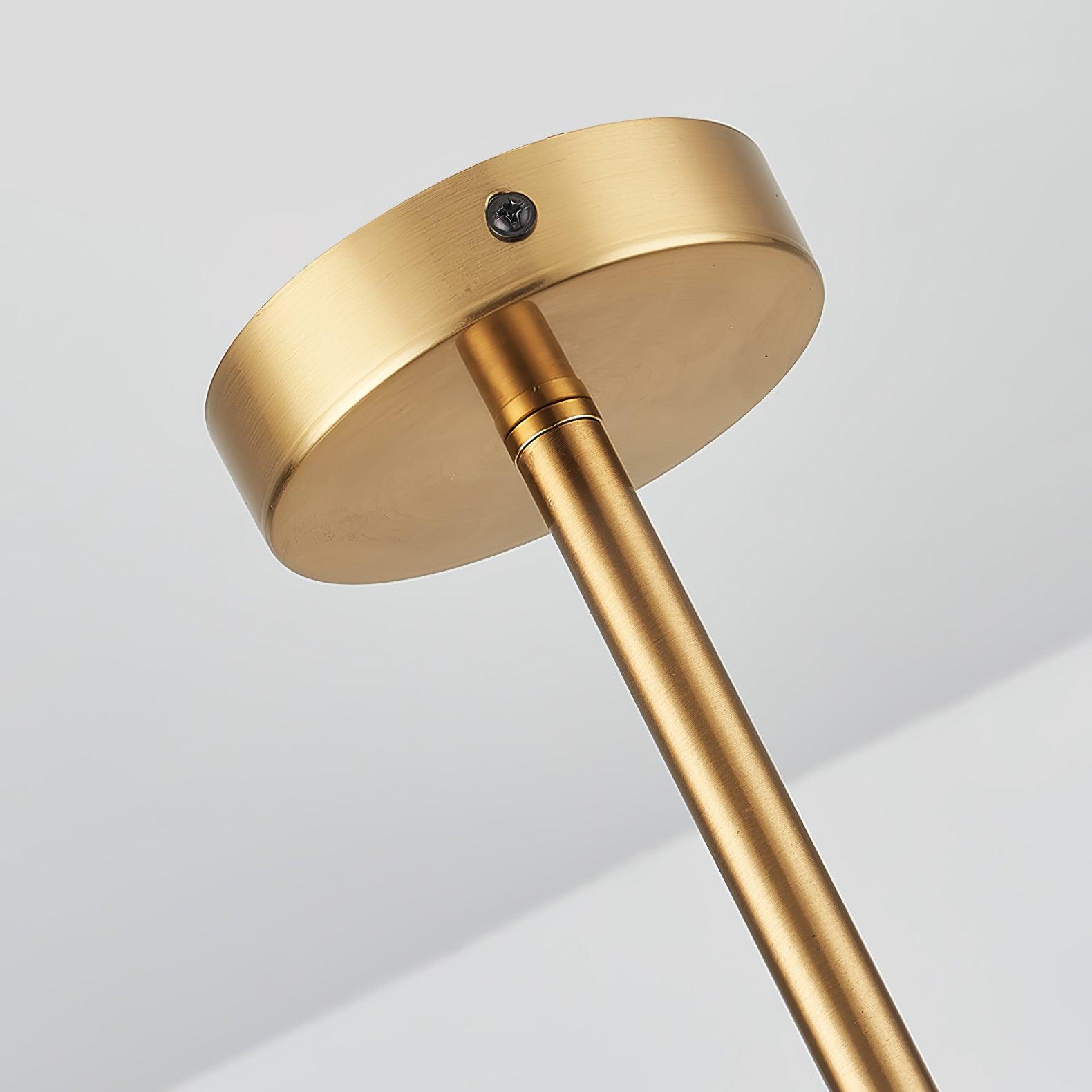 Close-up of round gold-toned ceiling canopy with side screw and straight rod connection