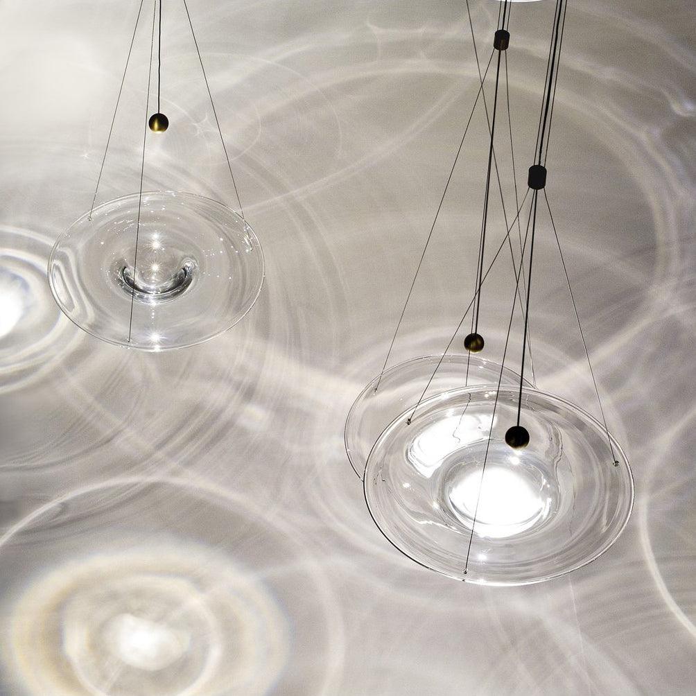 Glass discs and circular light patterns viewed from above