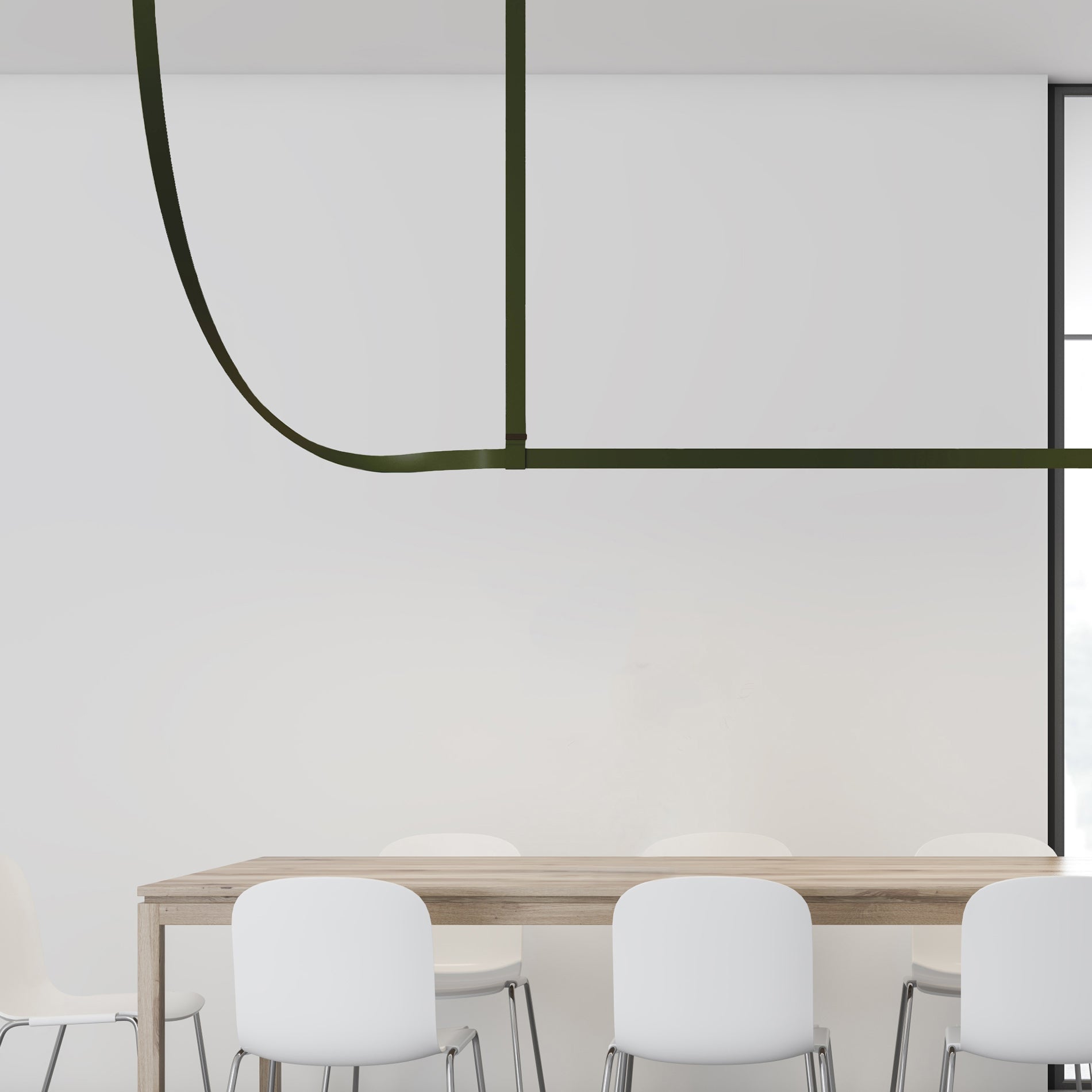 Dark green curved suspension end above white dining chairs
