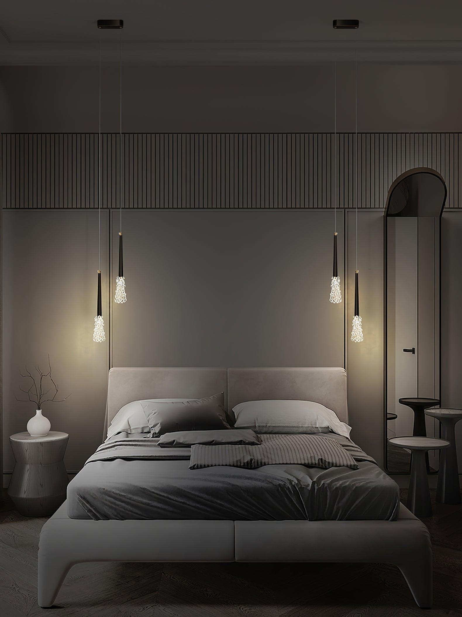 Dark-finish textured pendants in a bedroom scene