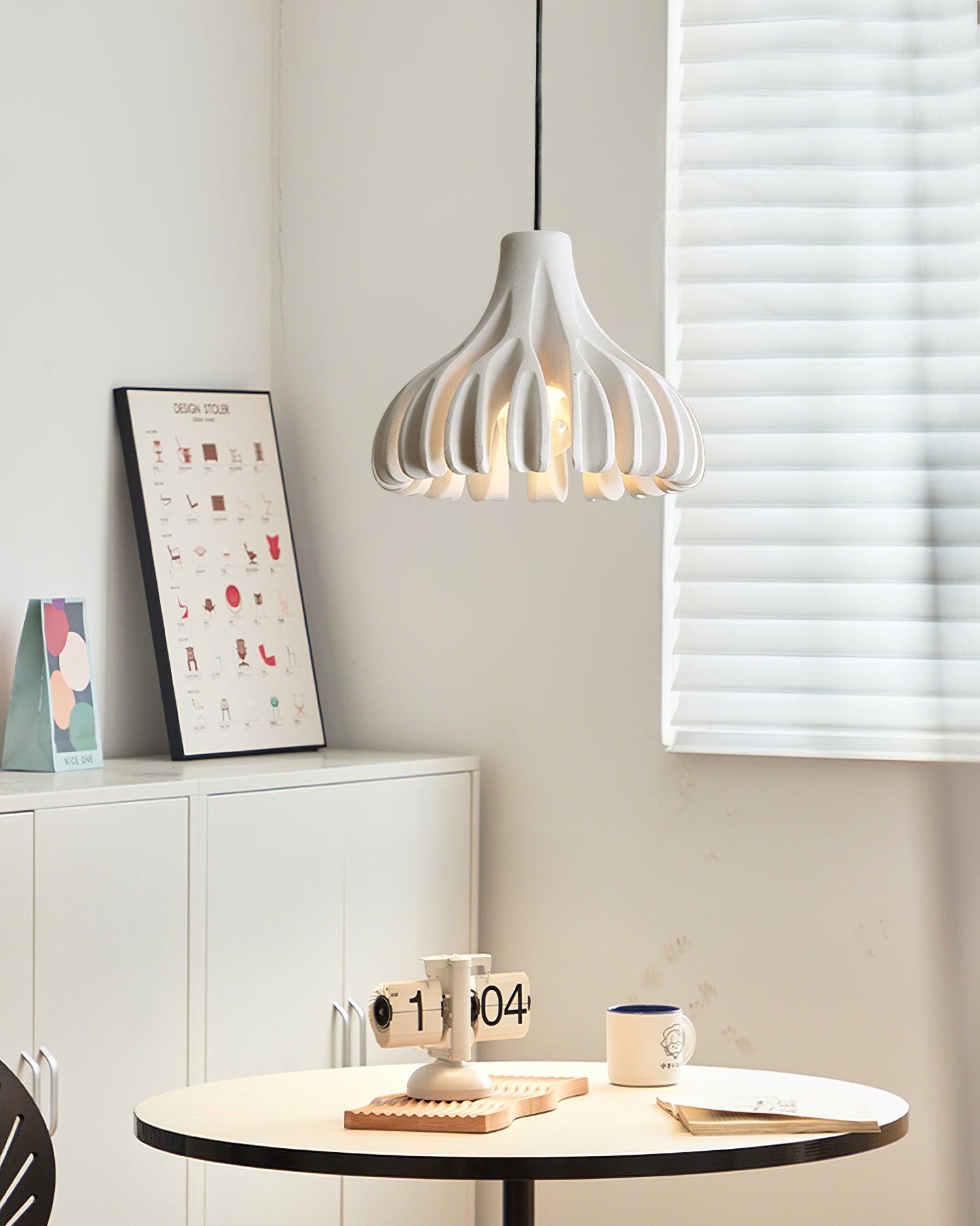 White Coral pendant beside a dining table