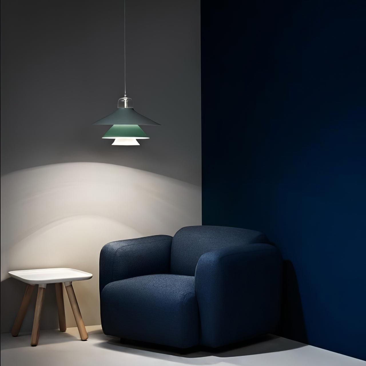 Green layered pendant in a dark lounge corner