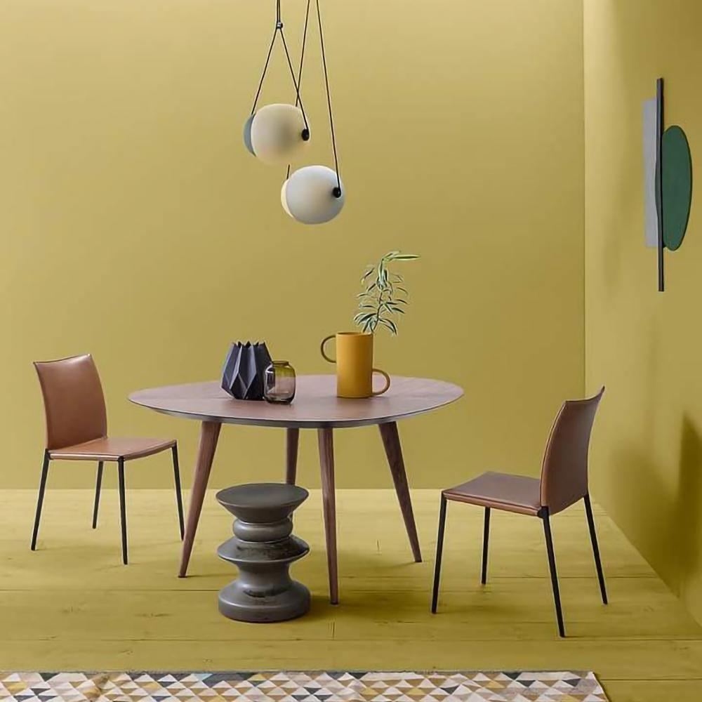 Two small rounded pendants above a table